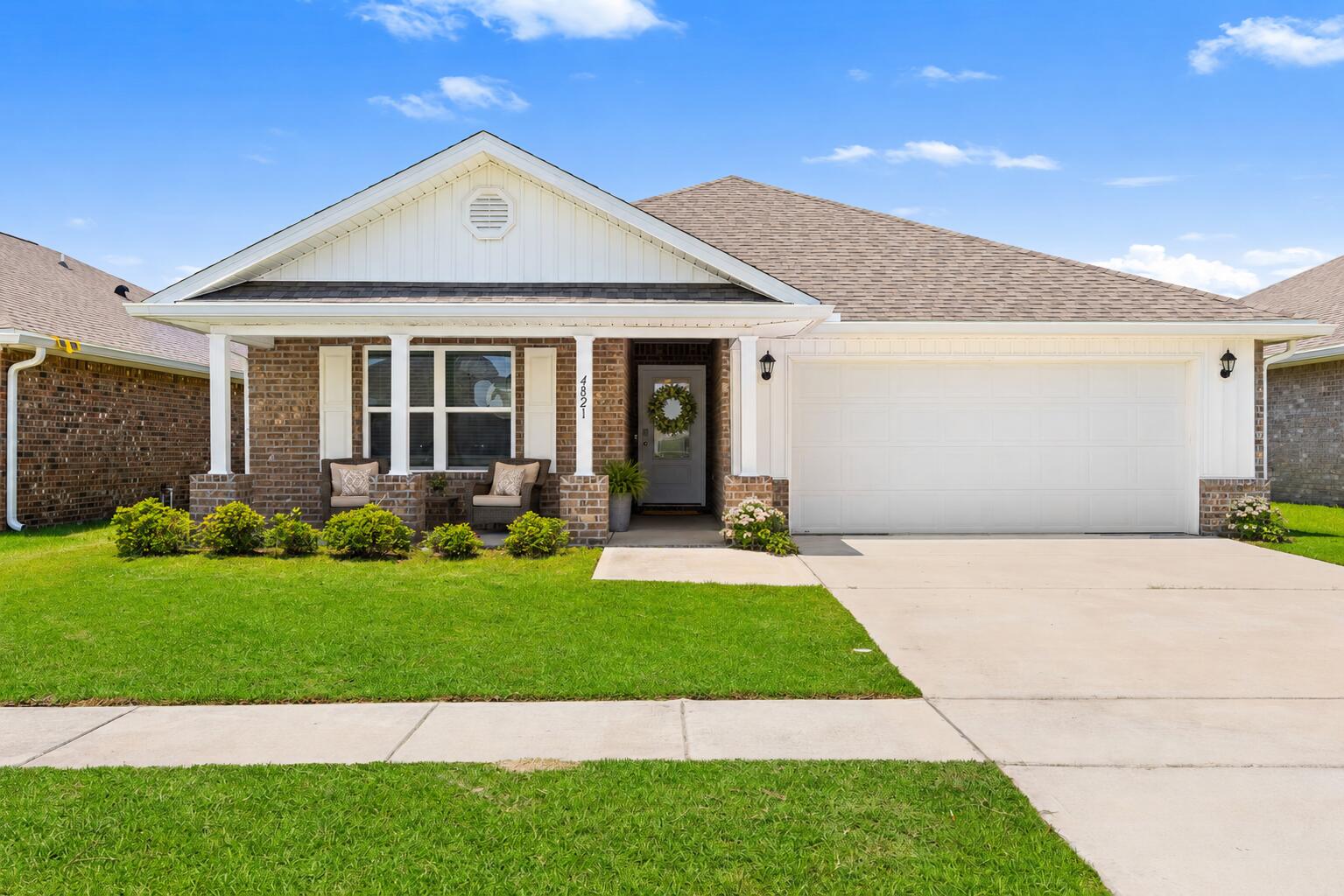 Welcome to 4821 Conner Lane, located in the highly sought-after Liberty community in Panama City! This beautifully maintained Ryder floor plan offers 4 bedrooms, 2 bathrooms, and a 2-car garage with a functional layout designed for everyday living and entertaining. Inside, you'll find an open-concept design featuring durable luxury vinyl plank flooring throughout the main living areas, neutral paint colors, and 8-foot ceilings that create a bright and inviting atmosphere. The spacious kitchen serves as the heart of the home and offers a large center island, pantry, ample cabinetry, and generous countertop space, making meal preparation and gatherings a breeze. The split-bedroom floor plan provides privacy for the primary suite, which features dual walk-in closets and an ensuite bathroom with a double vanity and spacious layout. Three additional bedrooms offer flexibility for guests, a home office, or growing households. Step outside and enjoy all that Liberty has to offer. One of Bay County's most popular master-planned communities, Liberty features beautifully maintained common areas, sidewalks throughout the neighborhood, multiple community pools, playgrounds, parks, and scenic walking paths. Residents also enjoy convenient access to shopping, dining, schools, Tyndall Air Force Base, and the growing amenities along the Highway 231 corridor.
