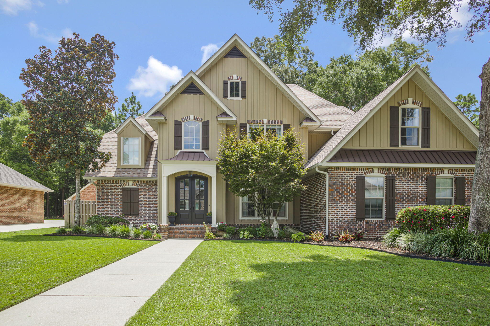 Welcome to one of the finest homes in the Nature Trail community, positioned on one of the neighborhood's most desirable lots! Backing to the protected natural conservancy, this exceptional POOL home offers unmatched privacy and the assurance of no future rear neighbors. Thoughtfully updated throughout and move-in ready, the home has a 2025 roof, 2025 water heater and 2022 HVAC (see MLS documents for the complete list of upgrades). A grand two-story foyer with soaring 18-foot ceilings is complemented by rich knotty pine hardwood flooring flowing throughout the main living areas. The inviting living room features custom built-in shelving, a gas fireplace, recessed lighting, and beautiful architectural details, including elegant arches and a striking staircase railing. The spacious primary suite overlooks the backyard oasis and includes an ensuite bath with a soaking tub, separate shower, walk-in closet, and private water closet. The elegant kitchen offers warm wood cabinetry, granite countertops, a large corner pantry, breakfast bar, breakfast nook, and a reverse osmosis water system. Upstairs, two bedrooms share a Jack-and-Jill bath, while the expansive bonus room offers endless possibilities as a fifth bedroom or guest suite. A private office adjoining the bonus room adds even more versatility. Step outside to your own private retreat featuring a sparkling saltwater pool with a new liner and equipment, covered porch, fire pit, expansive green space, new privacy fence, and bl ack metal pool fence. Additional highlights include a sprinkler system and oversized two-car garage with extra storage. Nature Trail spans nearly 750 acres, including over 400 acres of preserved natural beauty with miles of walking and biking trails. Residents enjoy a gated entrance, a 10-acre recreation complex with tennis courts, resort-style pool, fitness center, and a 6,000-square-foot lodge. All of this is minutes from shopping, dining, entertainment, and convenient interstate access!