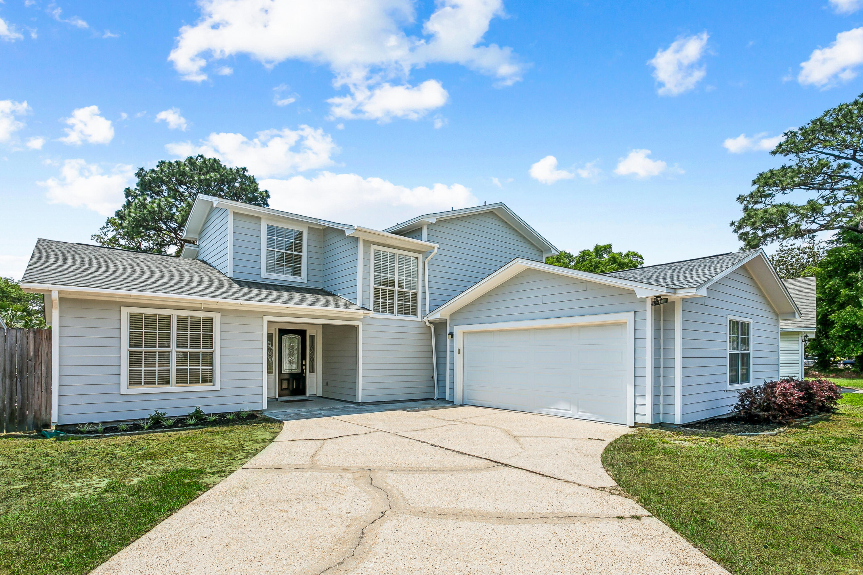 Seller willing to assist with closing costs/rate buy down!   Welcome to this beautifully updated corner-lot home in the desirable Bluewater Bay neighborhood of Meadow Woods, offering unbeatable convenience and coastal living. With easy access to the Mid-Bay Bridge, you can reach the stunning white-sand beaches in under 15 minutes. Shops, A rated schools, and Eglin AFB are all close by, making this an ideal location.
Freshly painted inside and out, this home feels bright, clean, and move-in ready. Step inside to soaring ceilings and a welcoming gas fireplace that anchors the spacious Great Room, featuring all-tile flooring for easy maintenance. The kitchen opens to the living area and includes granite countertops, stainless steel appliances, a breakfast bar, and a sunny dining space. A utility room with washer/dryer hookups adds everyday convenience.
The main level includes two bedrooms with brand-new natural wood-look LVP flooring and a shared full bath. Upstairs, the private master suite offers a peaceful retreat with its own balcony (recently redone), a double-vanity bath, and a large walk-in shower. A loft area provides flexible space for an office, reading nook, or hobby area. The staircase and master bedroom also feature the newly installed LVP flooring.
A door from the kitchen leads to the fully fenced backyard, perfect for pets, play, or outdoor entertaining.
Major system updates add peace of mind: Roof replaced in 2020, HVAC in 2017, and gas HWH 2026.
All with NO HOA!