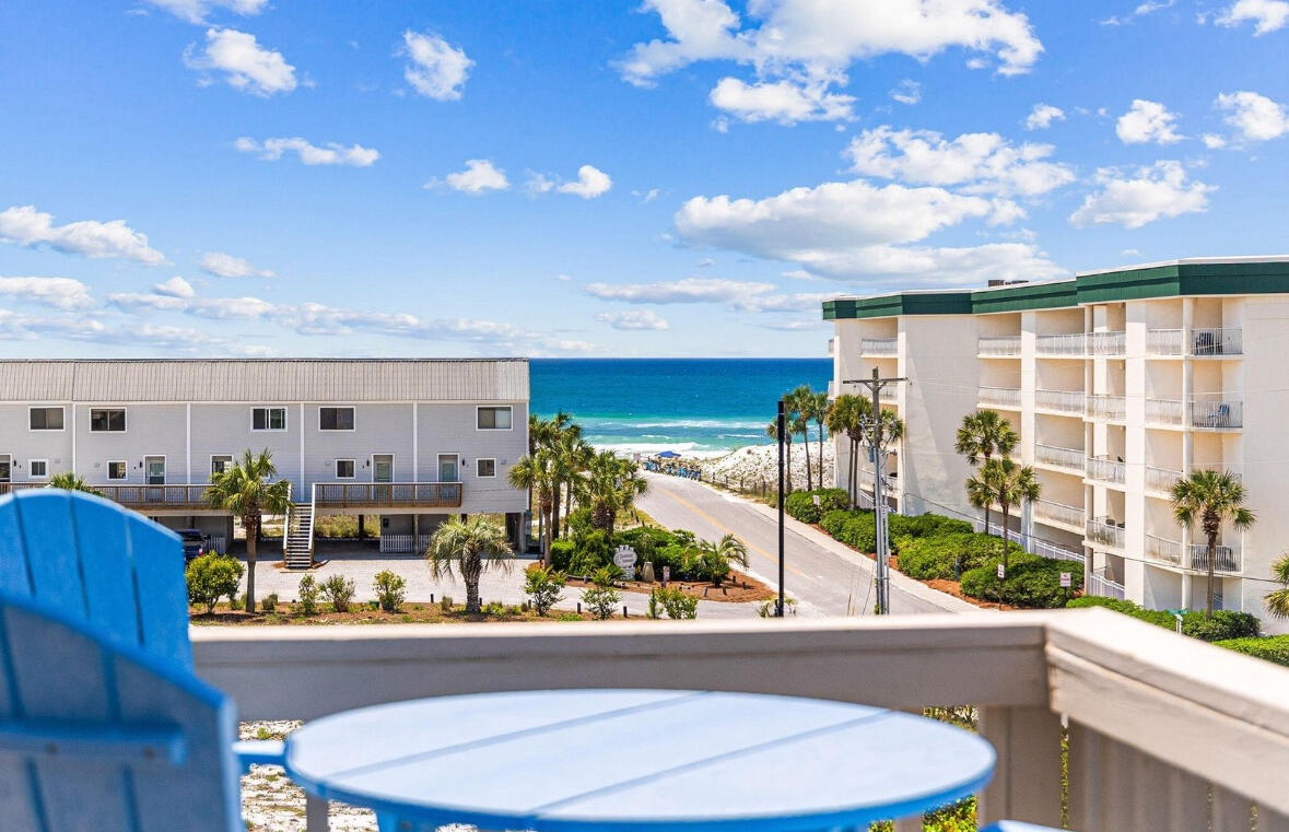 RENTAL MACHINE!  Actual rental history of over $58k in 2025 and ACTUAL bookings of over $74k in 2026.  Gulf Views & Top-Floor Living at Beachfront II.  Beach access located 450 feet away.  All of the features that keep renters coming back!  Beautifully manicured landscaping, large community pool area, stunning Gulf views, updated interiors, and a top-floor location--this turnkey-ready unit at Beachfront II has it all! Being the end unit on the top floor, you'll enjoy the best views in the building. Take in direct Gulf vistas from your living room or step onto your private wraparound patio to soak in the breeze and sound of the waves. 
Inside, the unit features numerous upgrades including luxury vinyl plank flooring throughout, shiplap accent walls, vaulted ceilings that enhance the open, airy feel, and a fully updated kitchen and bathroom. You can reach the unit via the stairs at the end of the building leading right to your front door, or use the centrally located elevator for easy access to unit 307A.  Upon entering, you're greeted by abundant natural light pouring through two sliding glass doors. The entryway's shiplap detailing and upgraded LVP floors set a warm coastal tone. The bathroom, immediately to your left, showcases a walk-in shower with custom pebble floor, granite countertops, and a stylish shiplap accent wall. Back in the main living area, you'll find a large storage closet for your beach gear, a pantry/linen closet, and a cozy dining nook complete with an owner's closet. The spacious living area which is bright and open thanks to those vaulted ceilings, flows seamlessly onto the balcony, the perfect spot to relax and enjoy the view. The wraparound balcony provides ample seating so everyone can take in the Gulf scenery together.
Upstairs, the loft offers two queen beds and built-in storage, an efficient and inviting space for guests when it's time to retire for the evening.
What about the Amenities?  Beachfront II offers fantastic community amenities, including a laundry room conveniently located across from the elevator on the ground floor. Outside, a winding pathway leads to lush landscaping and beautifully maintained common areas featuring paver walkways, picnic tables, grills, a covered gazebo, and a sparkling pool and hot tub. Beach access is 450 down the street and can be easily seen from unit 307A. 
Located on the East end of 30A you have easy access to restaurants and boutiques like Old Florida Fish House, Coastside 30A, Buddy's Seafood Market, and so much more.