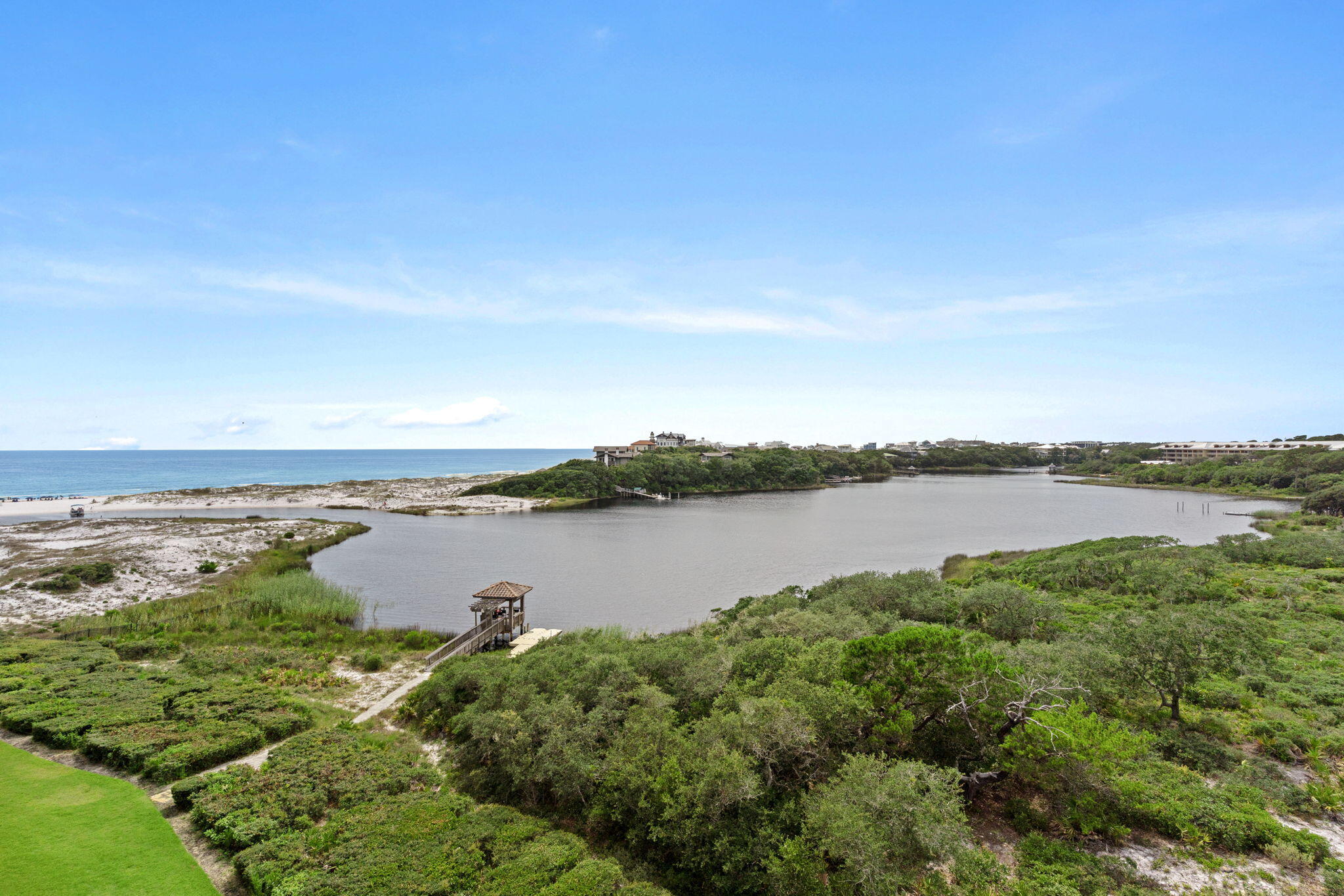 Experience the pinnacle of coastal luxury in this exceptional four-bedroom, four-and-a-half-bath residence at Sanctuary by the Sea, one of 30A's most sought-after beachfront communities. Spanning 3,163 square feet across the top two floors, this fully furnished condominium has been refreshed with new carpet and fresh interior paint, offering a move-in-ready opportunity for full-time living or a luxurious second home. Enjoy breathtaking, unobstructed southwestern views of Big Redfish Lake and the Gulf of Mexico from two expansive balconies, including an impressive 22' x 38' second-level terrace designed for entertaining and outdoor living. The thoughtfully designed floor plan features two waterfront primary suites, an open-concept living and dining area, and a chef's kitchen appointed with Viking appliances, granite countertops, custom cabinetry, dual islands, and a beverage station. Additional highlights include floor-to-ceiling windows and doors, soaring 10-foot ceilings, abundant natural light, and a spacious laundry room. Nestled on 23 gated acres between Grayton Beach State Park and Blue Mountain Beach, Sanctuary by the Sea offers an unparalleled blend of privacy, luxury, and natural beauty. Residents enjoy 650 feet of private beach access, three resort-style pools with waterfalls, fountains, hot tubs, and zero-entry access, as well as outdoor fire pits and grilling areas. A private boardwalk and dock on Big Redfish Lake provide opportunities for kayaking, paddleboarding, and fishing. Community amenities also include a state-of-the-art fitness center, golf simulator, theater room, and 24-hour security.

Ideally located just minutes from WaterColor and Seaside, this extraordinary residence offers the ultimate 30A lifestyle with world-class amenities and unforgettable coastal views.
