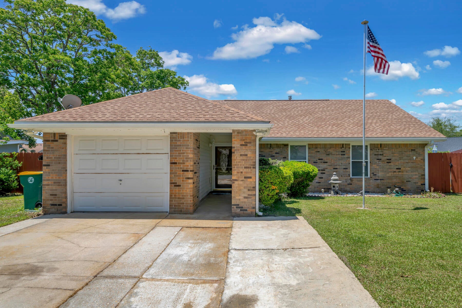 Live minutes from the beach and close to everything you need on the Emerald Coast! This sturdy (plywood) 3-bedroom/2-bath POOL home is in a quiet, no-HOA neighborhood and is updated and move-in ready! The lot gives plenty of privacy, so you won't feel like you share space with your neighbors. Home features tile floors, updated bathrooms, a breakfast bar, and a dual-use (gas/wood) fireplace with bonus living room! New HVAC system (2022 w/warranty), newer roof (2018), hot water heater (2019), new fridge (2022), gas stove, & epoxy garage floor. The home includes a screened Florida room adjoining the in-ground pool with a new (2024) Hayward variable speed pool pump & filter system. Brand new privacy fence installed 2025.