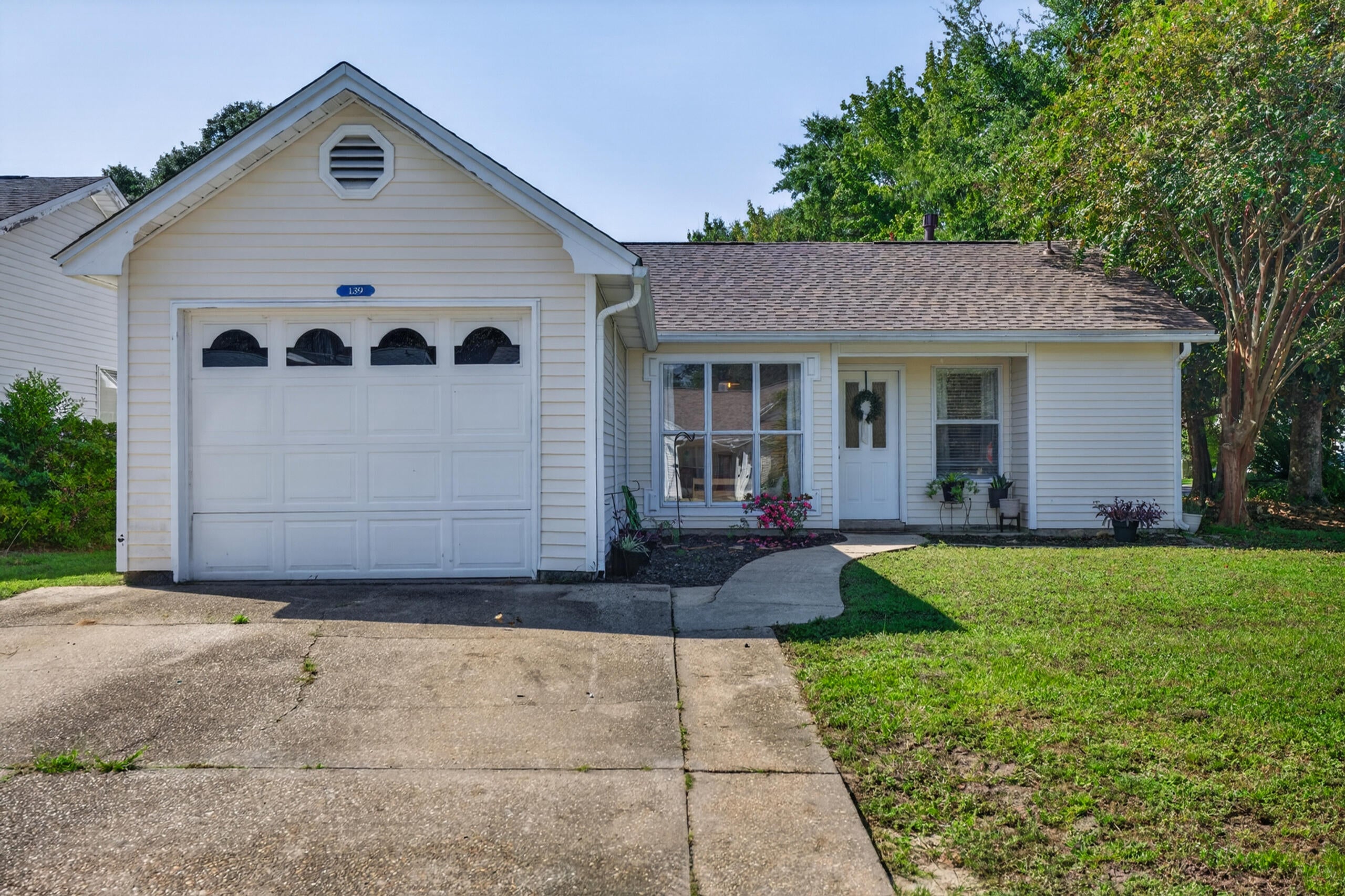Renovated, move-in ready, and tucked into the Bluewater Bay community, this charming three-bedroom home in Blue Pine Village offers an impressive combination of thoughtful updates, inviting outdoor space, and neighborhood amenities. Major improvements include a roof replaced in 2023, HVAC replaced in 2016, and tankless hot water heater replaced in 2019. The home also underwent an extensive renovation in 2024, bringing a fresh, updated feel throughout.

At the heart of the renovation is a beautifully redesigned kitchen featuring granite countertops, updated cabinetry, and stainless steel appliances. New vinyl flooring complements the home's light and welcoming interior, while updated plumbing and lighting fixtures, fresh paint, and a tiled primary shower add stylish finishing touches.

Situated on a corner lot, the property offers plenty to enjoy outdoors as well. The private, fenced backyard features a covered rear porch and open patio, creating an inviting extension of the living space for relaxing or entertaining. A vinyl storage building provides additional space for tools, outdoor equipment, and storage.

Blue Pine Village is part of the Bluewater Bay communities and offers low HOA fees along with its own community pool. An RV and boat parking area is also available for an additional charge. The property is currently zoned for Bluewater Bay Elementary.