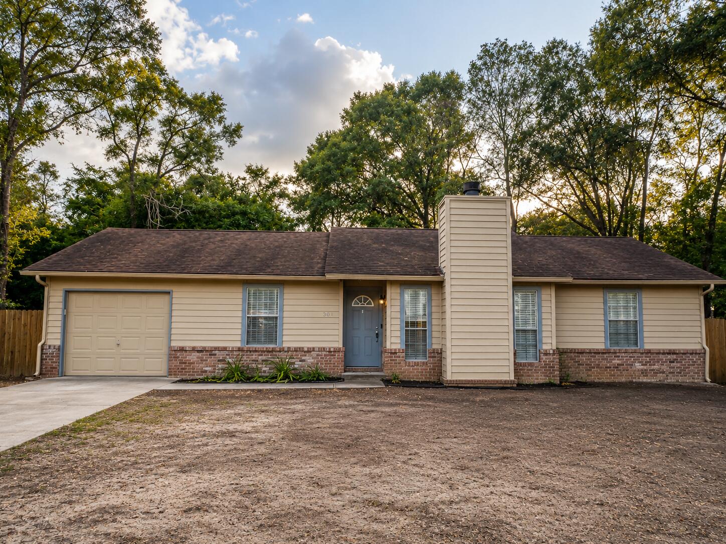 PRICE REDUCTION AND MOVE IN READY!!! Conveniently located with easy access to the new bypass, this inviting 3-bedroom, 2-bath home sits on a large lot, and offers plenty of outdoor space to enjoy outdoor entertaining, grilling, relaxation and playing with your fur babies. Open back patio with a privacy-fenced backyard. Inside, you'll find a cozy wood-burning fireplace, a convenient breakfast bar, a galley-style kitchen, and a spacious laundry room that is adjacent to the kitchen and garage. Recently painted throughout, the home is clean, bright, and ready for you to make it your own. This home is pet friendly with no breed restrictions, because we know pets are family, too. Approved pets are welcome with a $400 non-refundable pet fee. No inside smoking or vaping. Apply today at www.rentgoodlife.com.