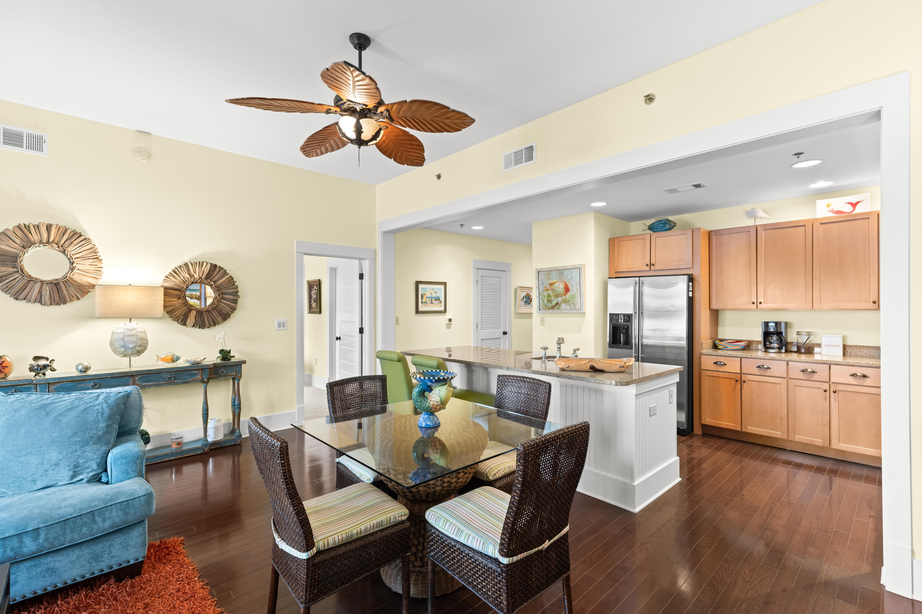 Tucked away on the quiet preserve side of Redfish Village, M2-314 offers a rare combination of privacy, space, and never-rented ownership. This beautifully maintained 3-bedroom, 3-bath residence features 1,485 square feet of comfortable coastal living with an open floor plan, hardwood floors, granite countertops, and spacious guest suites. Backing up to the preserve and neighboring Lakeside community, the location creates one of the most peaceful settings in all of Redfish Village--well removed from road noise and high-traffic areas.

The oversized primary suite includes private balcony access, while the open kitchen and living area flow seamlessly for entertaining and relaxing after a day at the beach. Lovingly cared for as a private family retreat and never used as a rental, the condo shows pride of ownership throughout.

Redfish Village owners enjoy private deeded beach access with shuttle service, a resort-style pool, fitness center, owner's lounge, playground, grilling areas, and direct access to the Timpoochee Trail in the heart of Blue Mountain Beach. With recent community improvements including new roofs and strong reserves, this is an exceptional opportunity to own one of the quietest and best-kept units in Redfish Village.