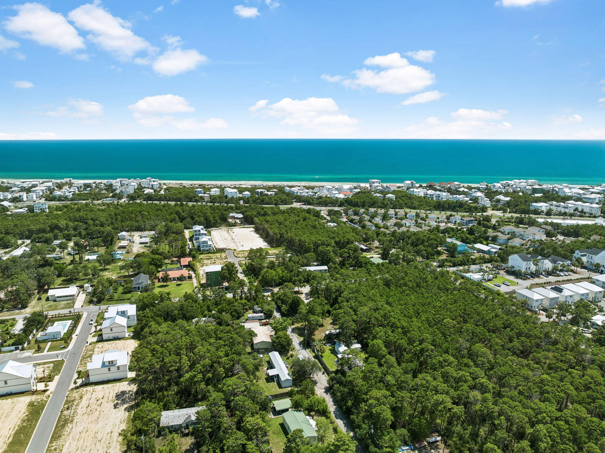 Prime .20-Acre Coastal Lot in North Inlet Beach - High & Dry with Passive Income!
Embrace the Ultimate Coastal Lifestyle nestled in the highly sought-after North Inlet Beach area.

Seize this rare opportunity to own a premium, high-and-dry .20-acre parcel with gulf view at  50 feet.   Boasting an impressive elevation of 26 feet above sea level, this property sits securely in Flood Zone X, meaning lender-mandated flood insurance is not required. It offers the perfect, worry-free canvas for your custom coastal retreat, blending an unbeatable location with a built-in income stream.

Positioned just moments away from the iconic Scenic Highway 30A, you are minutes from world-class dining, upscale shopping, and vibrant local entertainment. Best of all, you are just 0.4 miles from the Inlet Beach Regional Access. This premier access point ensures effortless, stress-free beach days with ample parking, clean restroom facilities, and a seamless beach walkover straight to the sugar-white sands.

Forget the usual headaches of raw land development--this property is already equipped with on-site water and electricity, saving you significant time and upfront costs.
Even better, the lot features an RV currently on-site with an active lease, generating $900 per month in passive income. With the lease strategically scheduled to end in February, 2027, you get the perfect financial buffer. Enjoy a steady cash flow while you comfortably design and permit your dream build. Size & Elevation: .20 Acres, high and dry at 26 feet above sea level
Flood Zone: Desirable Flood Zone X (No flood insurance required)
Proximity: Only ~0.4 miles to the Inlet Beach Regional Access (parking, restrooms, walkover) and immediate proximity to 30A
Utilities: On-site water and electricity already in place
Income Stream: $900/month RV rental income
Timeline: Lease wraps up in February--perfectly aligned with standard pre-construction planning timelines.
Whether you are a savvy investor looking for a high-demand pocket or a future homeowner ready to build a custom beach house, this lot offers the perfect bridge between a smart investment and the coastal lifestyle you've been dreaming of.
Don't miss out--secure your piece of paradise and let the property pay for itself while you plan your build!
