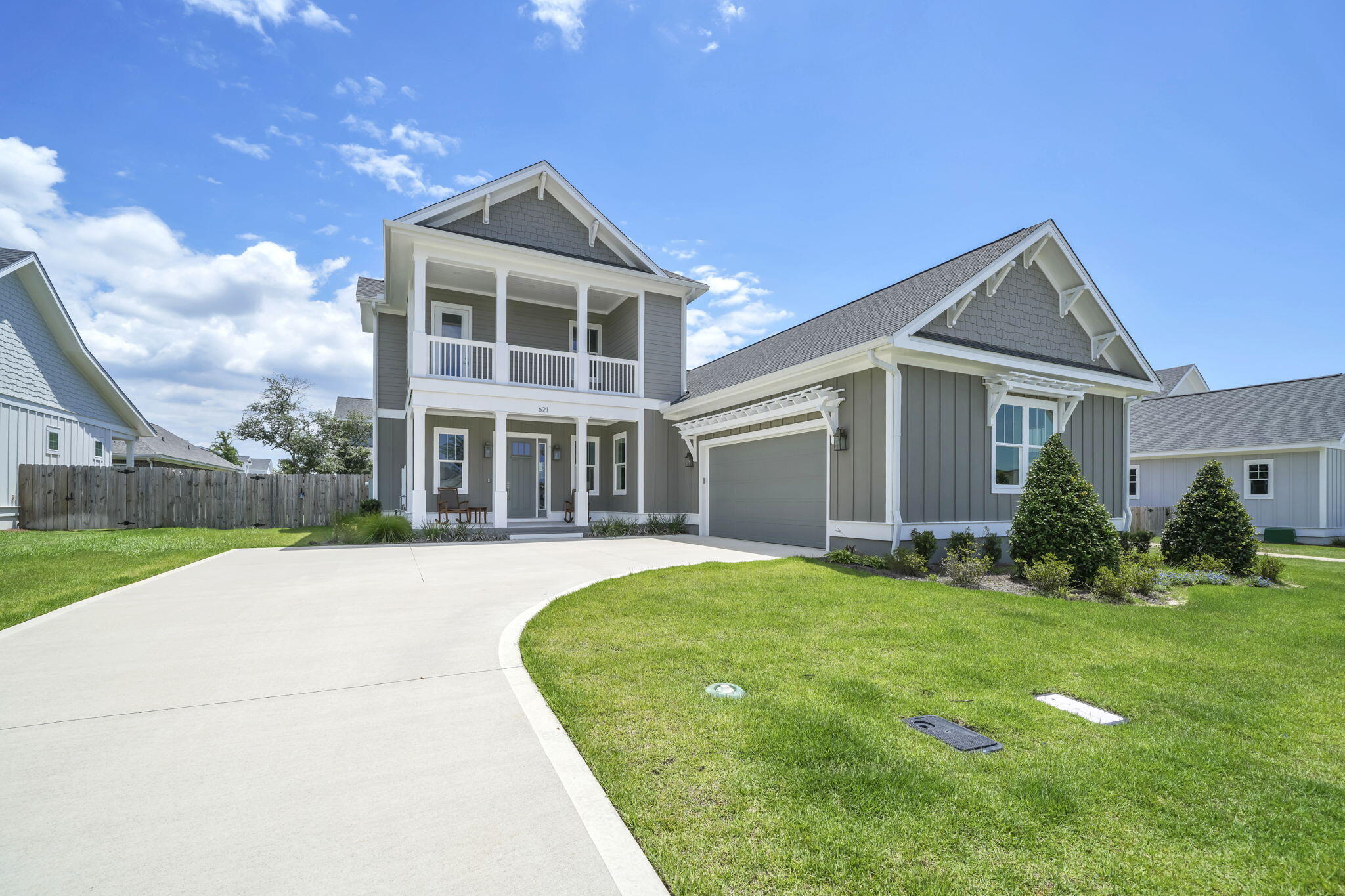 PRICE IMPROVEMENT! Exquisitely designed, 4 Bed, 3 1/2 half bath  w/ a gathering room upstairs for a media room, office, playroom or gym! Plus a wetbar. Almost 2800 sf ,open floorplan w/ceiling beams in the living, dining room and kitchen, custom trim & accent walls. Gas fireplace, surrounded by wood built ins & Sinker Cypress mantle. Spacious kitchen, w/ quartz counter tops ,custom cabinetry, metal, Z-line hood & designer lighting & walk in pantry. The master is on the first floor along w/ another guest bedroom /office. Master bath has deep, soaker tub, walk in shower and double vanities. & spacious closet! Upstairs are 2 more bedrooms, full bath & generous size gathering rm w/ a walk out balcony. Taexx Pest control system &Termite bait stations. Prewired for sound, cable hub, security & ethernet. wall insulation between living spaces and Bedrooms. Sealed garage floors as well as front and back porch.