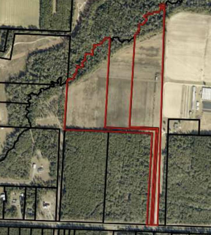 ENTERED FOR COMP PURPOSES ONLY. 15 acres divided from larger parcel. Has own entry, small well and shed. Survey provided by seller. Recorded restrictions.
