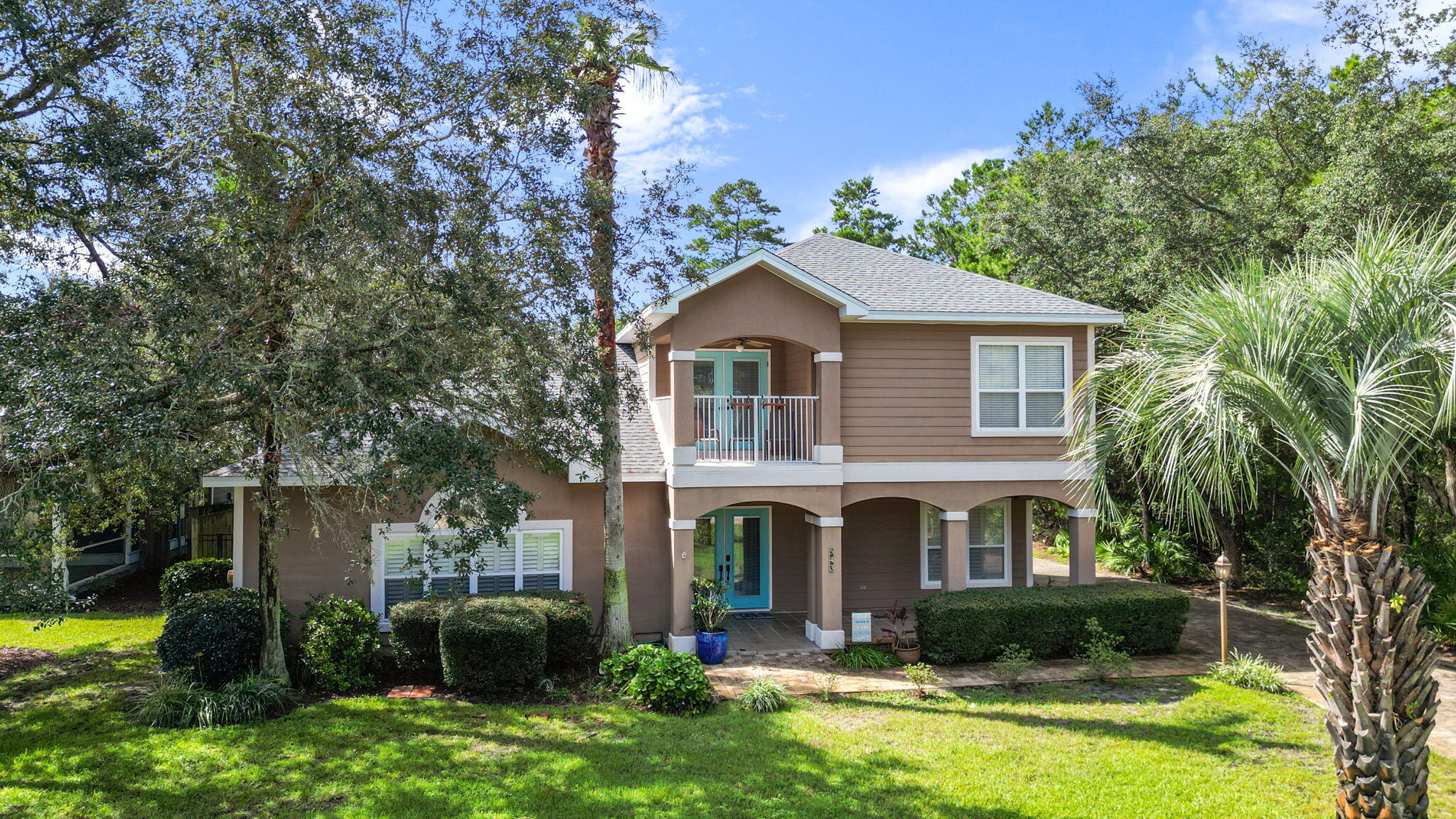 Bay views welcome you home to this 3-bedroom, 2.5-bath residence in the gated community of Pelican Bay, just across the street from Choctawhatchee Bay in Santa Rosa Beach. The primary suite is conveniently located downstairs with a walk-in closet, garden tub, and separate shower, while two spacious bedrooms share a full bath upstairs. The open living, dining, and kitchen area is filled with natural light and features granite countertops, a breakfast bar, gas fireplace, built-in bookcases, and rich hardwood floors. French doors lead from the dining area to a screened porch, and a second-floor covered balcony offers even more room to take in the bay views. The 0.31-acre lot leaves plenty of room to add a pool. Pelican Bay's gated, bayfront community includes a waterfront park with a dock, tennis and pickleball courts, and a playground -- all just minutes to shopping and dining. A rare chance to enjoy true bay-view living in one of Santa Rosa Beach's most sought-after gated communities. Roof 2022, HVAC 2026, W/H 2022