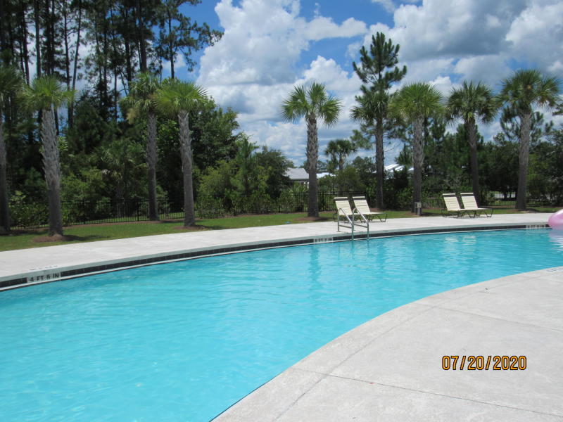 Welcome to this charming 2-bedroom, 2.5-bath townhouse offering comfort, convenience, and access to a community pool. Ideally situated directly across from an elementary school and just minutes from Publix, shopping, dining, and everyday conveniences, this home also provides an easy commute to the beautiful sugar-white sand beaches and emerald waters of 30A and South Walton.

Step inside to discover a bright and inviting interior featuring fresh neutral paint and durable flooring throughout with no carpet, creating a clean and modern living space. The open-concept main level offers a spacious living room with a cozy nook that can be used as a reading area, workspace, or additional seating space. The well-appointed eat-in kitchen is designed for both functionality and style, featuring a breakfast bar, sleek countertops, ample cabinetry, stainless steel appliances including a flat-top range, and an attractive backsplash. A convenient half bathroom and a screened-in back porch provide additional comfort and outdoor enjoyment.

Upstairs, you'll find two generously sized bedrooms, each offering its own private en-suite bathroom, making this layout ideal for privacy and flexibility. The laundry area is conveniently located on the second floor, and a washer and dryer are included for your convenience. Ample storage space can be found throughout the home to accommodate your everyday needs.

For added value and ease of living, pool care, lawn maintenance, and garbage service are all included in the rent. Pets may be considered on a case-by-case basis with prior owner approval and a non-refundable pet fee. Smoking is not permitted.

This well-maintained townhouse combines modern comforts, a convenient location, and a desirable coastal lifestyle. Contact us today to schedule your private showing and see all that this wonderful home has to offer.