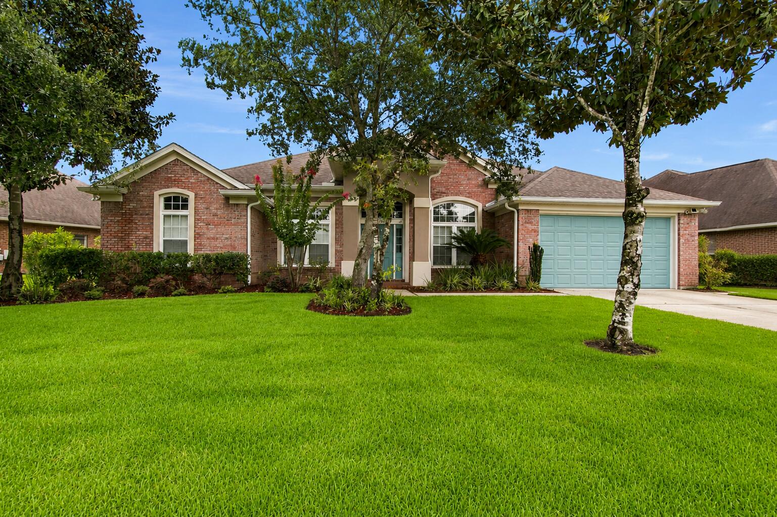 Welcome to 145 Mango Lane in the highly sought-after Hammock Bay community of Freeport! Perfectly positioned on a beautiful lake, this spacious 4-bedroom, 3-bath home offers 2,359 square feet of thoughtfully designed living space with peaceful waterfront views and numerous recent upgrades.

Since purchasing the home, the sellers have made several valuable improvements, including luxury vinyl plank flooring throughout the main living areas, a new submersible irrigation pump, new gutters, new sod, and a new hot water heater, providing added value and peace of mind for the next owner.

Inside, you'll find a functional open-concept floor plan that's ideal for both everyday living and entertaining. The generous living area flows seamlessly into the kitchen and dining space, while the split-bedroom layout offers privacy for household members and guests alike. With four spacious bedrooms and three full bathrooms, there's plenty of room for everyone to spread out comfortably.

Step outside and enjoy the tranquil lake setting from your backyard, where you can relax with your morning coffee, unwind after a long day, or simply take in the natural beauty that surrounds you.

Living in Hammock Bay means enjoying one of Northwest Florida's premier master-planned communities, featuring resort-style pools, fitness center, clubhouse, sports courts, walking and biking trails, parks, playgrounds, and a vibrant community atmosphere--all while being just a short drive from the white-sand beaches  of the Emerald Coast, shopping, dining, and top-rated schools.
If you've been searching for a move-in-ready lakefront home with modern updates in an exceptional community, 145 Mango Lane is one you won't want to miss. Schedule your private showing today!