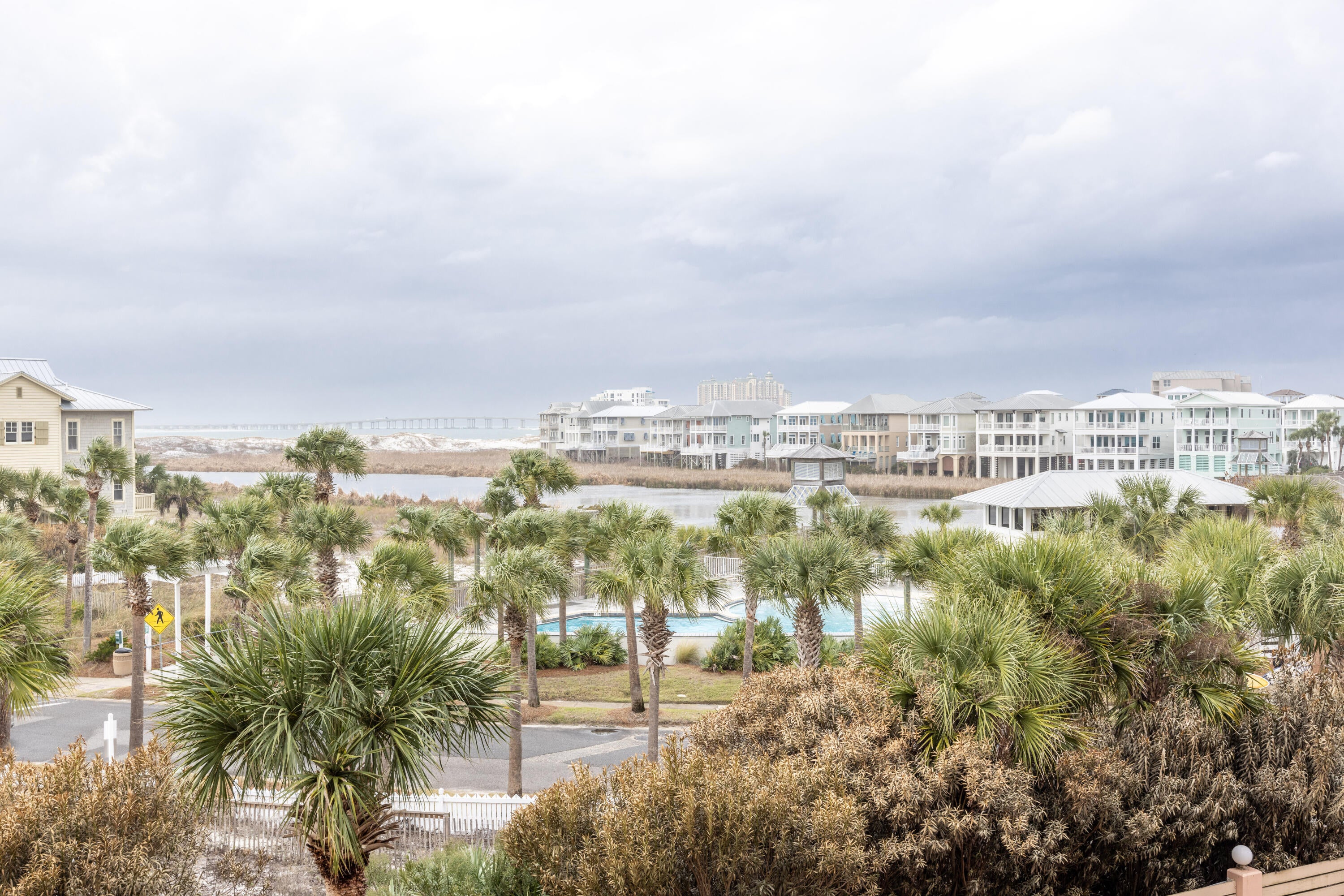 Jetty East is a gated, six-story Gulf-front midrise on Destin's sugar-white sand beach, with covered parking beneath the building. Located on Holiday Isle along Gulf Shore Drive, the property sits near Destin Harbor and offers an excellent setting for biking, walking, snorkeling, and fishing from the East Pass jetties. Jetty East is one of the few condo communities in the area with covered parking. The required Milestone Study and Structural Reserve Study were completed in mid-summer. An assessment was issued on August 1, 2024, for skylight replacement, and the work has been completed. Unit 204B is on the jetty side, offering balcony views of summer fireworks and sunsets. The unit features tile flooring throughout, with carpet in the bedrooms, and the bathroom includes a double vanity. Soft beige, blue, and green accents create a light, bright feel. The unit is currently occupied by a long-term tenant who has been in place for the past two years at a monthly rate of $2,500. A net sheet is available in the documents. Enjoy spectacular morning views, evening sunsets, and seasonal fireworks from the beach. The location is convenient to shopping, grocery stores, including the new Publix, and restaurants. Jetty East amenities include 900 feet of beach frontage, a 2,400-square-foot pool with sun deck, hot tub, beachside pavilion with charcoal grills, tennis courts, pickleball, fitness room, children's activities, live music entertainment, shuffleboard, covered parking, 24-hour security, and a lovely owner's room with a recently remodeled full kitchen for meetings or parties. Financing note: Short-term rental condos are considered non-warrantable or condotel properties and are not eligible for conventional government-backed Fannie Mae or Freddie Mac financing.