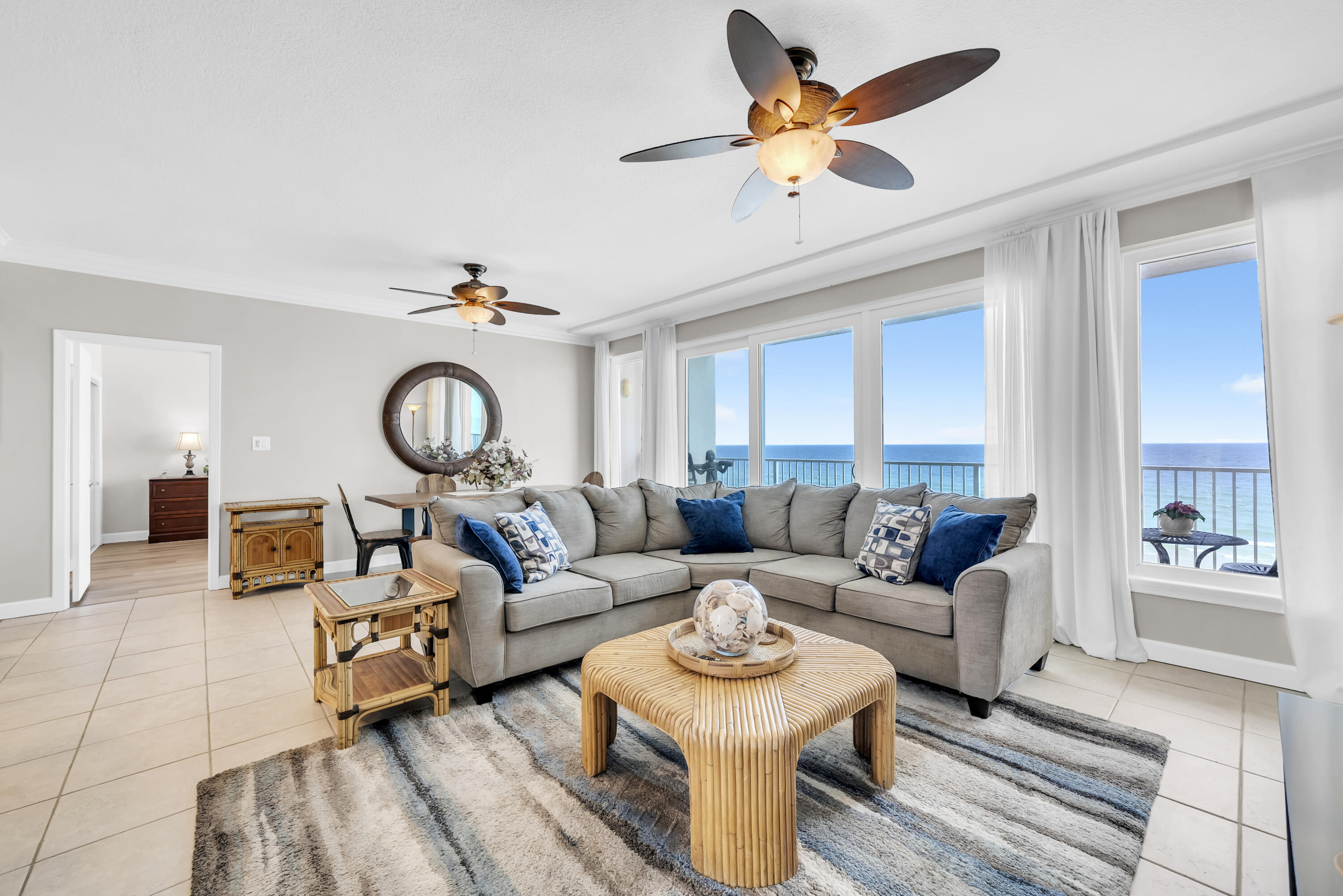 Compass Rose was designed for those who want Gulf-front ownership without the crowds, noise, and constant turnover that come with many vacation-rental buildings. With only 20 residences and a minimum 31-day rental policy, this low-density beachfront community offers a quieter, more residential ownership experience along Scenic Gulf Drive. Whether you're looking for a primary residence, second home, or long-term investment property, Unit 410 delivers something that has become increasingly difficult to find on the Emerald Coast: space, privacy, and direct connection to the beach. Positioned on the east end of the building, this corner residence captures sweeping Gulf views from nearly every room. The open-concept living, dining, and kitchen areas flow seamlessly onto an expansive 50-foot Gulf-front balcony, creating an ideal setting for morning coffee, evening sunsets, or entertaining family and friends. A wet bar complete with beverage cooler and ice maker adds convenience for hosting. The primary suite serves as a private retreat with Gulf views, balcony access, a large walk-in closet, and an ensuite bath featuring double vanities and a jetted tub/shower combination. The guest suite also offers direct balcony access, allowing guests to enjoy the same coastal views and breezes. Recent updates include new appliances in 2025, updated bedroom flooring, crown molding, and a four-year-old HVAC system. Offered fully furnished with no exclusions, the residence is move-in ready from day one. One of the most valuable features of Unit 410 is the amount of storage and parking it provides. The property includes two private assigned garage spaces, a beachside storage locker located beneath the building, and an additional owner's storage area at the front of the property--rare conveniences for Gulf-front ownership.
Compass Rose owners enjoy approximately 300 feet of private beachfront, a rooftop observation deck, fitness room, library, beach-level deck with outdoor shower, and children's play area. The building has also completed its Milestone Inspection and Certification, providing added confidence for future ownership. If you've been searching for a Gulf-front property where the beach feels less crowded, the building feels more private, and ownership feels simpler, Compass Rose 410 deserves a closer look.