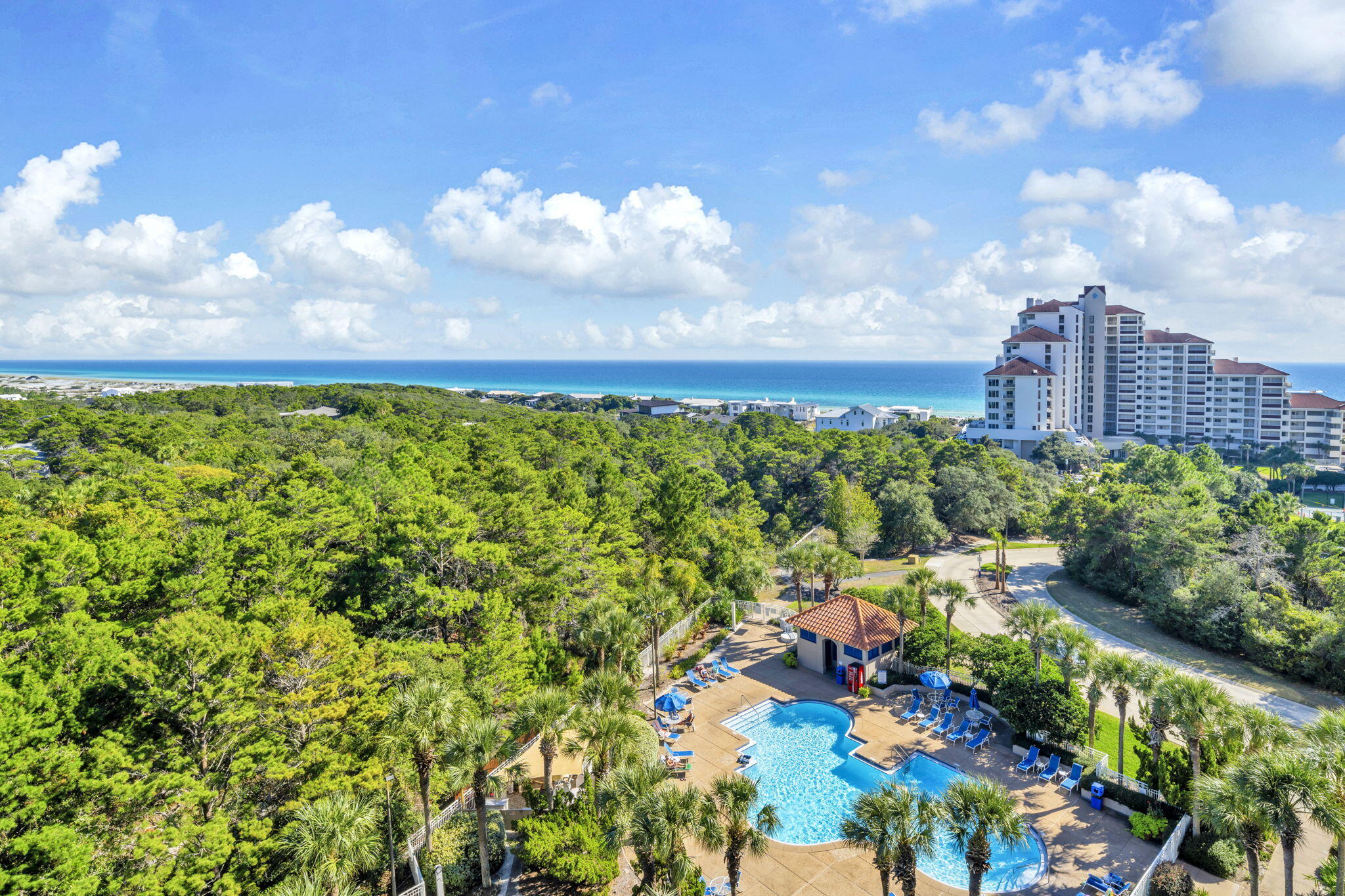 Beautiful expansive coastline views of the Gulf and Topsail Hill Preserve State Park from this lovely 8th floor lock out condo.  Stylish  and renovated  with , LVP flooring throughout,  granite counters, open kitchen and S/S appliances.  Glass and tile shower in the master bath. Shower tub in the guest bathroom.  Both are updated with matching granite vanities  and high end fixtures.    2 bedroom 2 bath and kitchen on one side and a large studio with a kitchenette on the other  Each has its own balcony. Enough room for the whole family to make vacation memories and you can also cash in $$$ on vacation rentals. 600' of  beach , pools, tennis (clay courts), fitness center, racquet ball, onsite restaurants , and many other fabulous amenities. Tops'l resort has many fun restaurants and attractions in the area.