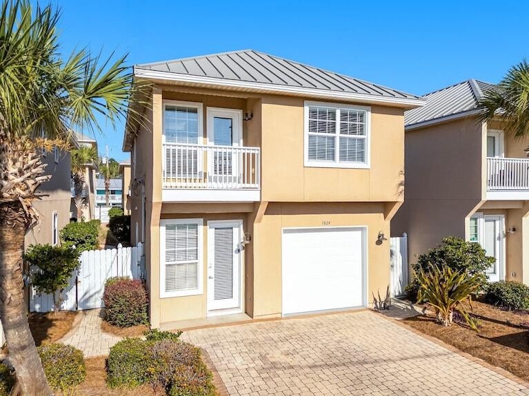 Just steps from the sugar-white sands of Panama City Beach, this income-producing vacation rental offers the location and amenities guests are looking for in a beach getaway. Currently operating as Palm Breeze Retreat, this 3-bedroom, 2.5-bath property is completely furnished, accommodates up to 10 guests and is located in the Villas of Panama with a community pool and beach access just a short walk away.

Inside, you'll find an inviting living area, dining space, and fully equipped kitchen with stainless steel appliances, stone countertops, and ample cabinetry. Sleeping arrangements are ideal for families and groups, while multiple balconies provide additional space to relax and enjoy the coastal air.

A converted garage game room adds even more guest appeal with arcade games, air hockey, darts, basketball, and more. Outdoor spaces include balconies, a patio and grill area, plus a second-floor balcony overlooking the community pool.

Located near Thomas Drive, St. Andrews State Park, dining, charter fishing, water activities, golf, shopping, and entertainment. Whether you're looking to expand your investment portfolio, own a vacation rental near the Gulf, or enjoy a beach retreat of your own, this property offers an exciting opportunity in Panama City Beach.