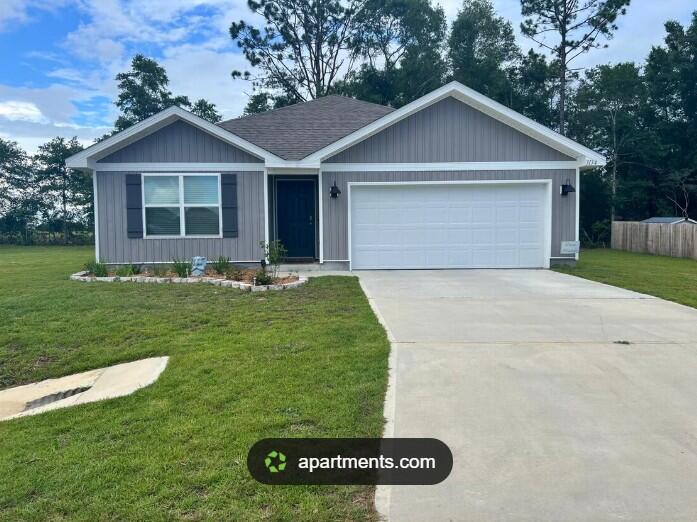 **SHORT SALE - PRICED AGGRESSIVELY TO SELL** Don't miss this opportunity to own this 4-bedroom, 2-bath home featuring the sought-after Freeport floor plan with an open-concept layout that's great for everyday living and entertaining. The kitchen offers a large island, pantry, stainless steel appliances, a smooth-top range, and a built-in microwave. The primary suite features a private bath and a spacious walk-in closet, while the additional bedrooms provide plenty of space for family, guests, or a home office. Wood-look flooring runs throughout the main living areas, with carpet in the bedrooms for added comfort. The home also includes Smart Home technology for added convenience. Conveniently located in the growing North Crestview area with easy access to Fort Walton Beach, Destin, shopping, dining, and nearby golf courses. This home has plenty of potential and is ready for its next owner!