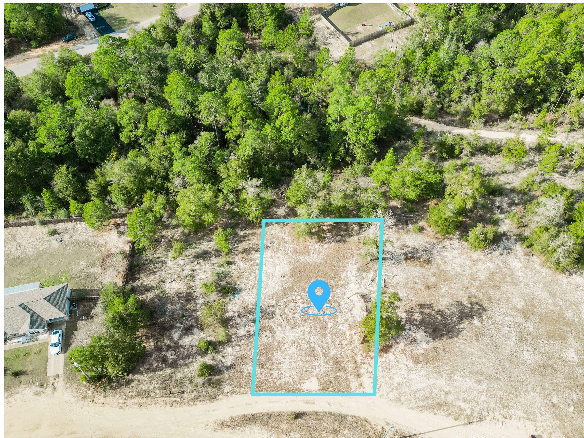 Build your dream home or place a manufactured home on this cleared lot conveniently located in the Crestview area. Measuring approximately 80 x 128 feet, this rectangular parcel offers a great layout for a variety of home designs. The lot is built ready with an electric meter already on property, public water available at the street, and Flood Zone X, offering added peace of mind. Zoned Agriculture / Residential Single Family / Mobile Home, this property allows flexibility for site-built or manufactured housing. Enjoy a convenient location with easy access to Crestview, Niceville, and Eglin Air Force Base, making it ideal for commuters, military personnel, or anyone seeking a balance of accessibility and space. Whether you're looking to build now or invest for the future,