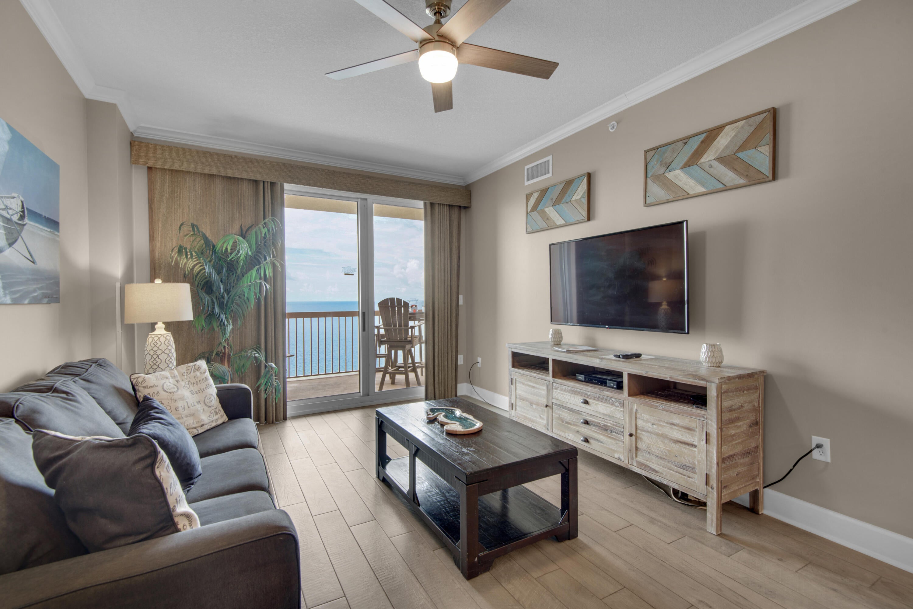 REMODELED SUNRISE BEACH 2BR + 2 BA + TWIN BUNK ROOM + OUTDOOR OWNER'S CLOSET! This is a spectacular 2BR+Bunk Room at Sunrise Beach, one of the most sought after resorts in PCB. This luxury condo has undergone an extensive custom coastal upgrade that includes new porcelain plank flooring thru-out, crown molding, all new paint, stainless steel appliances, tiled breakfast bar, upgraded LED light fixtures and fans, blackout curtains, and a brand new water heater. The 1-year old HVAC features a programmable Ecobee energy saving thermostat with motion detectors. It is a ''Five Star'' rental ready condo with every amenity including beach toys and supplies. Future bookings will convey along with repeat snowbirds booked for Jan/Feb of 2027. Your king master en-suite features double vanities and an oversized tub/shower with upgraded sliding glass doors . It also has direct access to the large Gulf front balcony that is fully furnished with new Polywood balcony furniture. Guest bedroom and bonus bunk room are larger than most. There is plenty of storage throughout this unit with ample closets and an oversized laundry area complete with full sized washer and dryer. A highly sought after outdoor owner's closet valued at $15,000 will also convey. Sunrise Beach is one of the very few resorts in PCB that has covered parking directly under the building (NO NEED TO PARK AND WALK ACROSS THE STREET!) It is conveniently located 1 mile east of Pier Park  and is convenient to all of the dining and entertainment venues (including the new Top Golf and Dolly's Pirate Voyage Dinner Theatre). It has amazing resort style amenities such as a BBQ area with gas grills, Gulf front fitness center, 2 swimming pools, 2 jacuzzi's, a popular children's mushroom play fountain, and a new snack/drink bar and market! SUNRISE BEACH IS OWNER CONTROLLED which means the homeowners own the gym, the pools, and receive the income from the Beach Chairs, etc. And, their HOA fees are some of the lowest on the beach. NOTE: ALL INFORMATION AND MEASUREMENTS ARE DEEMED RELIABLE HOWEVER NOT GUARANTEED. BUYER SHOULD CONFIRM ALL INFORMATION.
