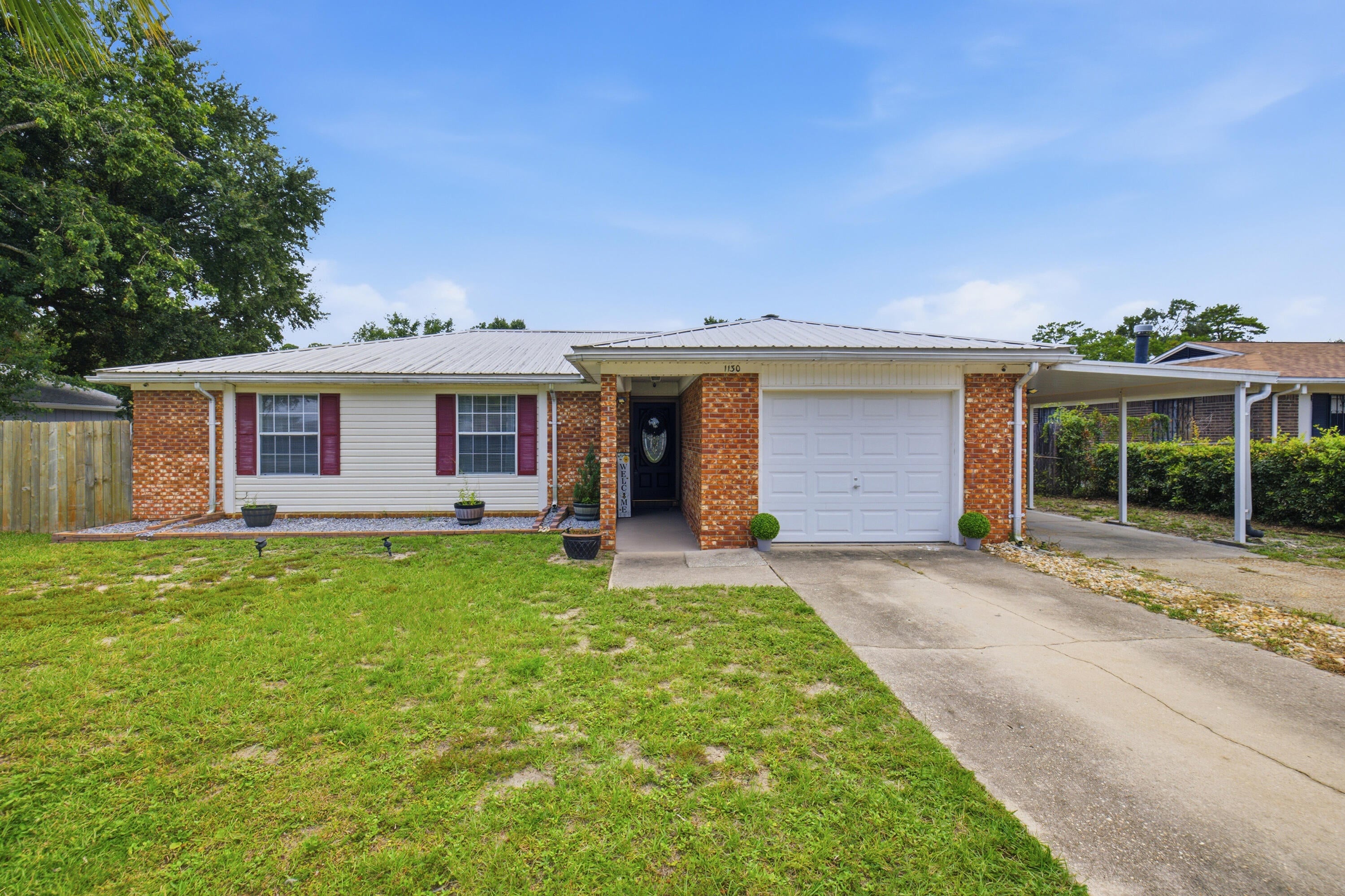 Welcome to this beautifully maintained, move-in-ready 3-bedroom, 2-bathroom home with NO HOA Fees in the heart of Niceville! 


Approx.15 Mins To Eglin AFB and 25 Mins to Destin Beaches and Shopping

Designed for relaxation and entertainment, the home features a sizable saltwater pool within the large screened patio area. The pool has a solar heater for year-round swimming, plus a new liner and pump (2026). A hand-crafted wood gazebo offers a cozy seating area within the enclosure. French doors open from the spacious living room to the pool, creating a seamless indoor-outdoor flow.

The kitchen boasts wood cabinetry, a breakfast bar, and an adjoining dining area. All bedrooms are situated down the hall, and the main bathroom features newer flooring, a modern vanity, and an updated mirror. The garage has been thoughtfully converted into an expansive laundry room with excellent cabinet storage and an indoor storage / workshop space.

Out back, discover a private, low-maintenance oasis complete with a privacy fence, fire pit, and artificial grass. The backyard also features a large, electrified workshop divided into workspace and convenient yard storage.

Key updates provide wonderful peace of mind: a 2020 HVAC system, a 2019 water heater, and a durable 2011 Metal roof.

Home features so many updates that the property appraisers site has updated the Effective Year Built to 2000 

This home is truly ready to go! Make your appointment to see it today. The listing agent believes that the information provided is accurate and true, the buyer and/or buyers agent should verify all pertinent details related to this property, including but not limited to parcel dimensions, room measurements, acreage, school zone, zoning, land-use, HOA info (if applicable), and any other information that may affect the buyer's decision to purchase this property.

No solar panels; that is a solar pool heater on the roof. Seller rarely uses it because it can lightly leak.

The yard shed, fence, sprinklers,  and lawn pump, if any, convey AS IS.