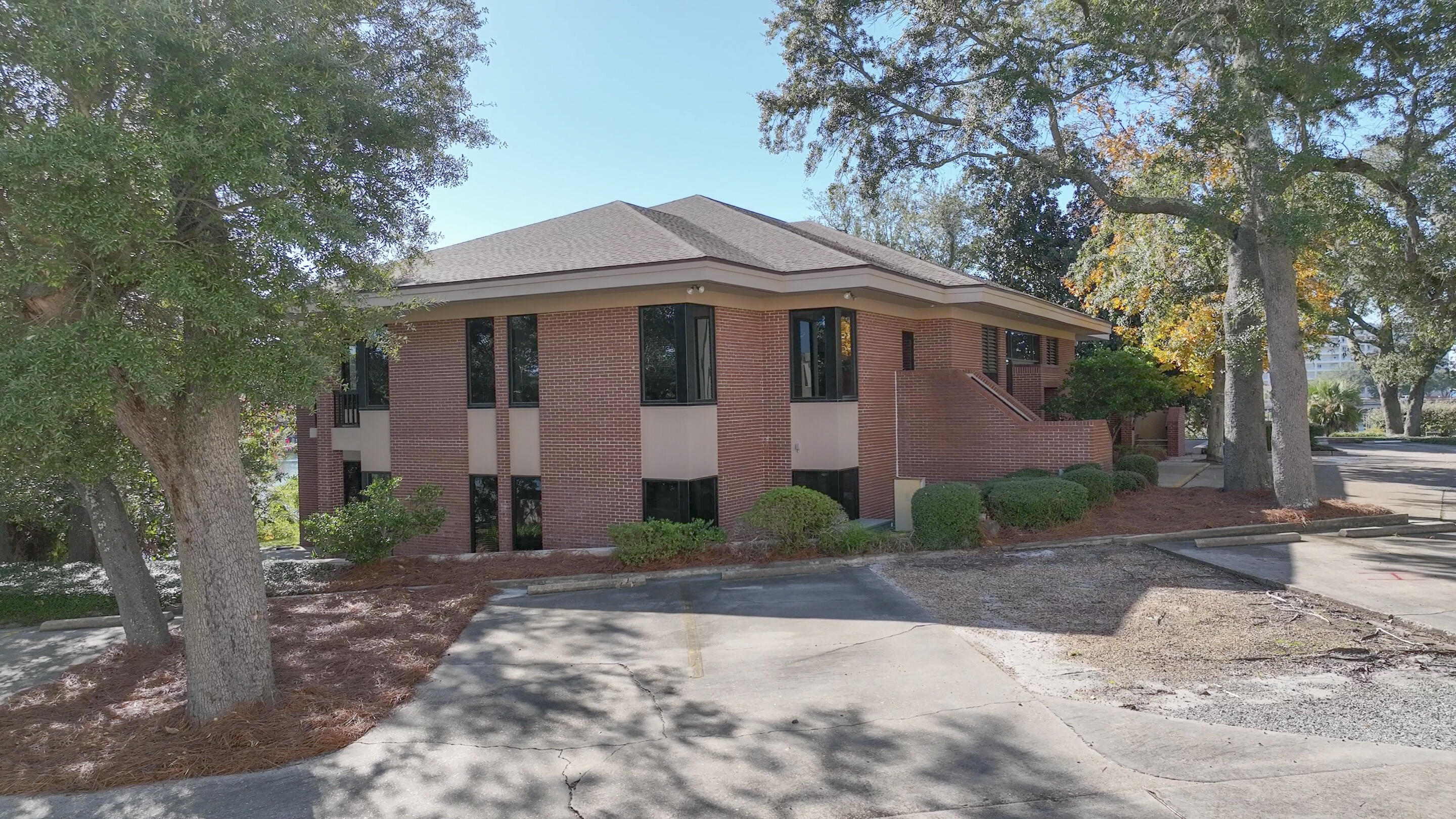 The Barron & Redding Law Office is available for lease. One of the most prestigious Class ''A'' law office buildings in Panama City. Located adjacent to the Bay County Courthouse on Massalina Bayou which leads directly to St. Andrew Bay and the Gulf of America. The 10,157 square foot, two-story office building is situated on 1.1 acres. Masonry construction with brick veneer and huge windows throughout. The entire office has extensive wood moldings, paneling, and trim, particularly in the attorney's offices, conference rooms, and law library. The two-story office includes 18 large private offices, 2 conference rooms, a law library, open office for paralegals and administration, workspace, large breakroom, and reception. Built in 1986 and renovated in 2019 following Hurricane Michael. The