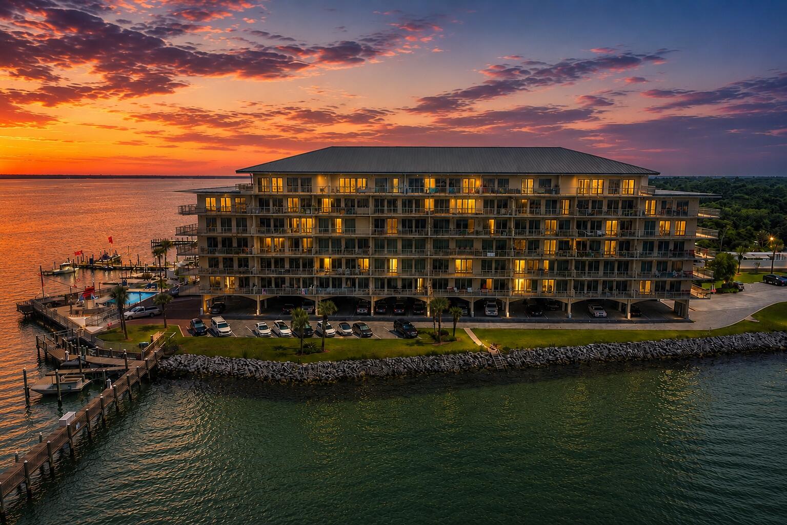 Where Destin's Waterways Meet! Unit 504 at Sides Moreno Point West offers a rare opportunity to own a spacious waterfront residence with sweeping panoramic views of the entrance to Destin Harbor, Norriego Point, Crab Island, Choctawhatchee Bay, the East Pass, and the Gulf beyond. Set within this gated, low-density community of only 44 residences, the property offers a quieter, more residential ownership experience that is increasingly rare along Destin's waterfront.

Spanning 2,196 square feet, this 3-bedroom, 3-bath condominium features 10-foot ceilings, expansive living and dining areas, and floor-to-ceiling, impact-resistant windows and doors designed to maximize natural light and the extraordinary southern exposure. Nearly every primary living space offers dramatic water views and the constant movement of boats, wildlife, sunsets, and harbor activity that make this stretch of Destin so unique.

The approximately 240-square-foot waterfront balcony serves as a true outdoor living space; it's ideal for morning coffee, evening sunsets, seasonal fireworks, or simply enjoying the ever-changing, always entertaining scenery surrounding Crab Island and the East Pass. The approximately 240-square-foot waterfront balcony serves as a true outdoor living space; it's ideal for morning coffee, evening sunsets, seasonal fireworks, or simply enjoying the ever-changing, always entertaining scenery surrounding Crab Island and East Pass.

The spacious waterfront primary suite faces directly south toward the Pass and Gulf and offers private balcony access, floor-to-ceiling windows, a walk-in closet, and a generously sized ensuite bath with double vanities, a jetted tub, and separate shower. Both guest bedrooms overlook the bay and marina to the north and feature ensuite baths, providing exceptional comfort and privacy for owners and guests alike.

The kitchen combines functionality with clean coastal styling and features GE Profile double ovens, generous storage and workspace, a breakfast bar, a bar sink, white cabinetry, an updated subway-tile backsplash, and a mix of stainless-steel and white appliances. The residence has also been thoughtfully refreshed with broad buyer appeal in mind, including brand-new luxury vinyl plank flooring throughout the main living areas, new neutral carpeting in all bedrooms, fresh interior paint, updated lighting, and new ceiling fans.

Additional features include remote-controlled Levelor shades on all south-facing windows and doors, a climate-controlled owner's storage cage, assigned covered garage parking, ample guest parking, building-wide WiFi with secure individual accounts, and an included Dish Network streaming service.

Sides Moreno Point West offers a gated entrance, waterfront pool, gazebo, grilling area, and community room, all located just moments from the always popular McGuire's Irish Pub, HarborWalk Village, waterfront dining, entertainment, boating, watersports, and the beaches of Okaloosa Island. Short-term rentals are not permitted, creating a more peaceful and residential coastal environment ideal for a primary residence, second home, or long-term retreat.

Residences within this low-density waterfront community are only sporadically available. Buyers seeking expansive views, generous living space, and a more residential waterfront lifestyle in the heart of Destin are encouraged to schedule a private showing with their Realtor or contact the listing agent directly for additional information.