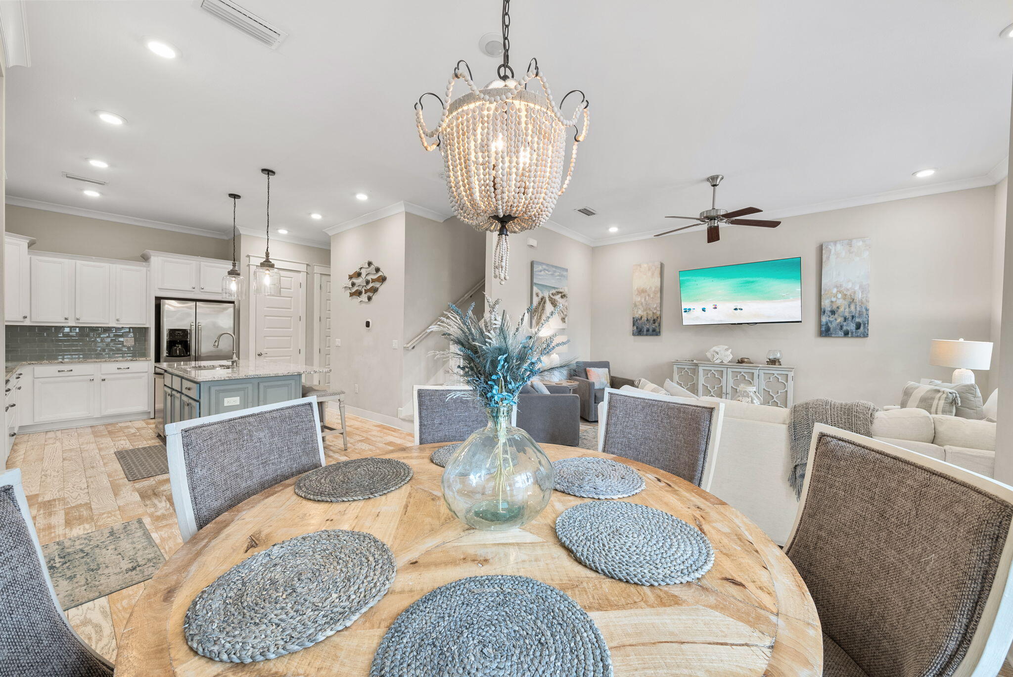 Turn-key, fully furnished, and GOLF CART INCLUDED--this beautifully appointed 3-bedroom, 2.5-bath Prominence B townhome is an ideal investment property, second home, or the perfect combination of both. Perfectly positioned in the heart of Prominence, this townhome is just a short stroll to the resort-style pool and community amenities. Inside, you'll find a professionally designed coastal interior featuring light hardwood floors, quartz countertops, custom cabinetry, glass subway tile backsplash, designer lighting, and upscale furnishings in calming natural and blue-green tones. Details have been thoughtfully curated, from upgraded plumbing fixtures and window treatments to the tankless Rinnai water heater, 10' ceilings, and 8' doors, creating a bright and refined gathering space. The attached two-car garage provides ample parking and storage, adding convenience and value. Located in the heart of Prominence along Scenic 30A, this home offers walkable access to the community's vibrant town center, The Big Chill (formerly The Hub), featuring restaurants, shopping, outdoor movies, concerts, and events. Ideally situated between Seagrove and Alys Beach and neighboring WaterSound, Prominence blends relaxed coastal living with energy and connection. This turn-key townhome delivers the very best of the 30A lifestyle!