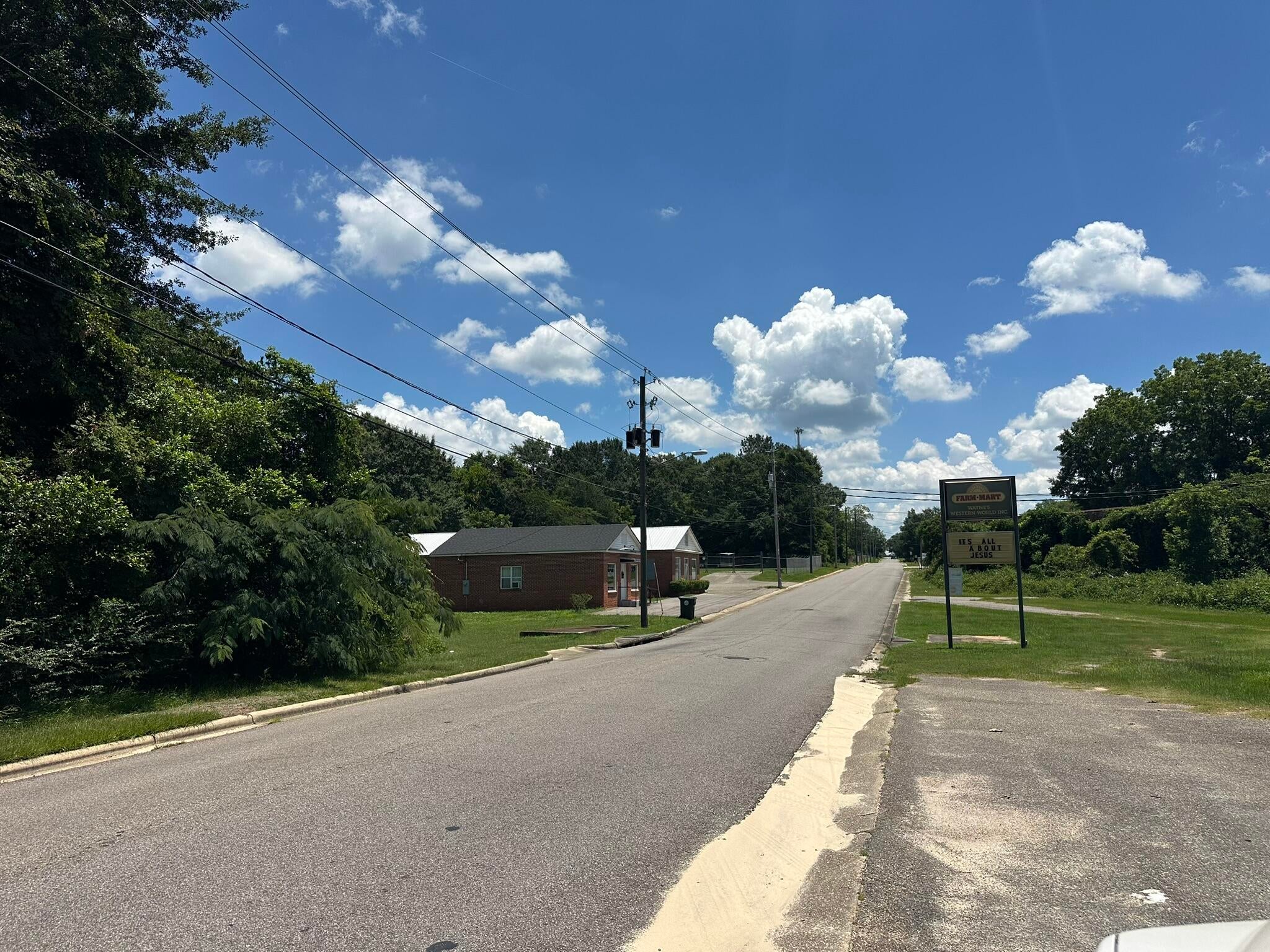 Commercial lot located in Andalusia, Alabama! This property backs up to the Andalusia Farmers Co-op and is situated in an established industrial area with a mix of commercial, multifamily, and single-family properties nearby. Convenient to downtown Andalusia, this lot offers potential for a variety of commercial or investment uses. Owner holds title via tax deed. Buyer and buyer's agent to verify all information deemed important, including zoning, permitted use, utilities, access, property dimensions, and suitability for buyer's intended use. Sellers hold title via tax deed.