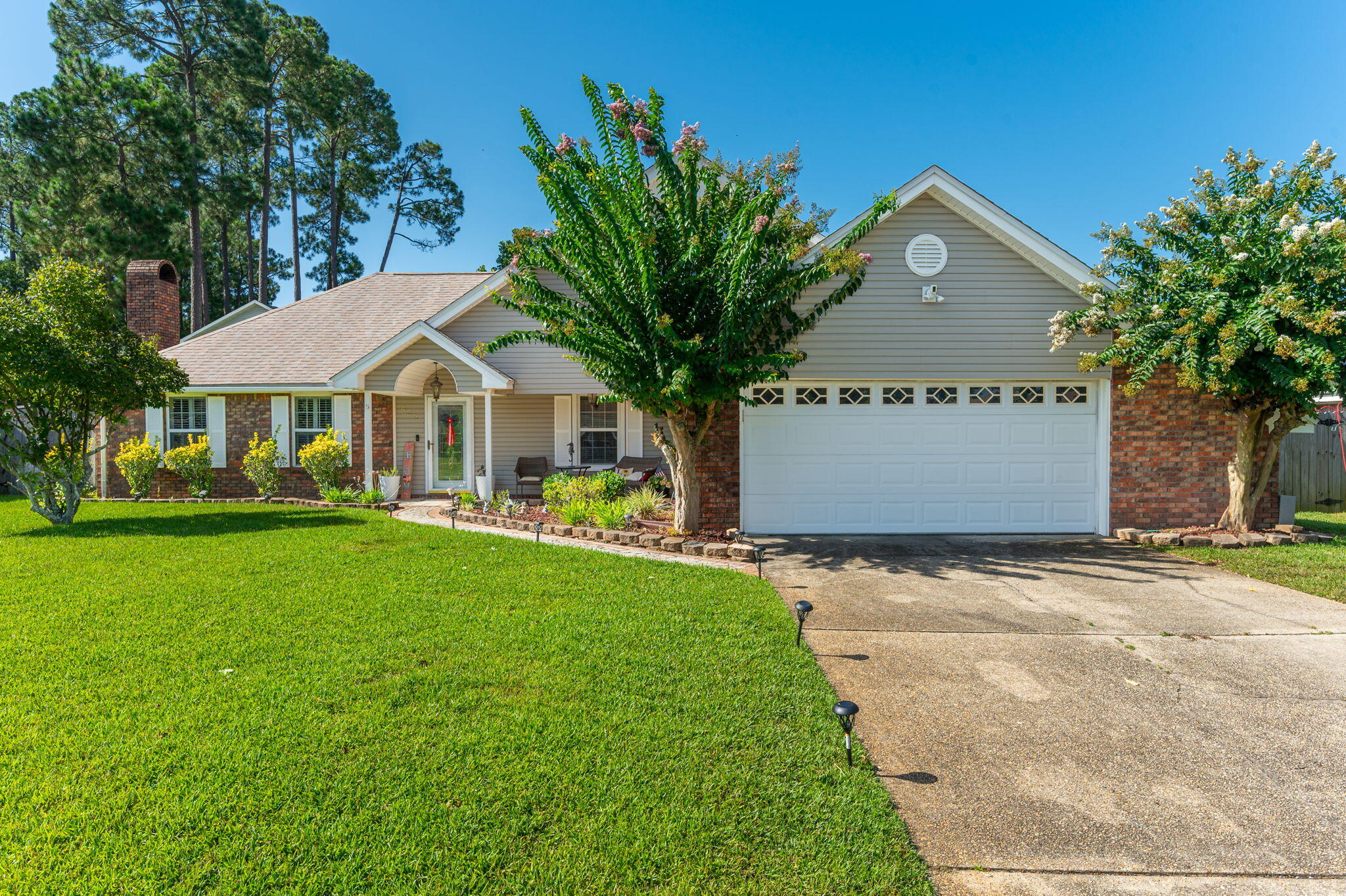 5 BD POOL HOME in a great location.  To say that this home is near everything in Fort Walton Beach would be an understatement. FWB HCA Hospital is 1.2 mi, FWB Golf Course is 2 mi, Lowes 1.2 mi, Walmart and Sam's are 1.5 mi, and beach access is 6.5 mi. Doesn't that scream close to everything? Welcome home to this charming two-story retreat, thoughtfully designed for both everyday living and effortless entertaining. With five spacious bedrooms and three well-appointed bathrooms, there's plenty of room for family, guests, and everything in between.
Step outside to your own private backyard oasis, where a sparkling pool, relaxing hot tub, and expansive deck create the perfect setting for weekend barbecues, evening gatherings, or simply unwinding under the ambient deck lighting after a long day.
Inside, the spacious family room welcomes you with a cozy fireplace, creating the perfect place to gather during cooler evenings. The heart of the home is the beautifully accented kitchen, featuring warm maple cabinetry, granite countertops, stainless steel appliances, and a casual eat-in dining area. Overlooking the pool and backyard, it's an ideal space to cook, dine, and stay connected with family and guests.
Adding even more versatility, the heated and cooled sunroom provides year-round comfort while offering peaceful views of the beautiful backyard oasis--making it the perfect spot for morning coffee, reading, or simply enjoying the scenery.
This home blends comfort, functionality, an inviting indoor-outdoor living, making it a wonderful place to create lasting memories.