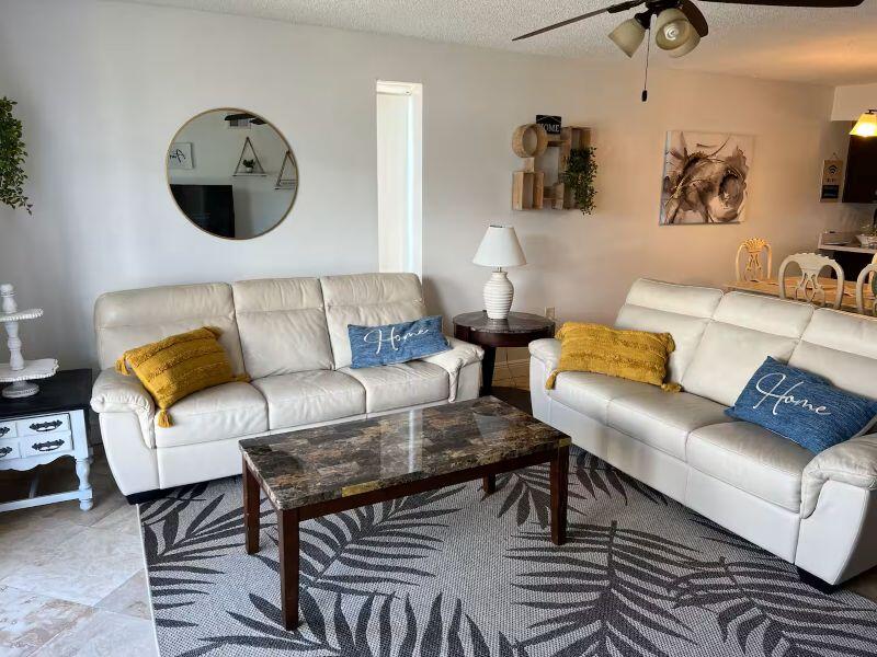 Available Sept 9, 2026. Fully furnished • First floor • Corner unit • Walk to the beach! Enjoy easy coastal living in this fully furnished condo featuring 2 bedrooms, 2 baths, and approximately 1,200 sq. ft. of comfortable living space.
The primary bedroom includes a walk-in shower. A tub/shower is in the second bedroom bath. The fully equipped kitchen offers a convenient pantry. A full-size washer and dryer are also included. Covered back patio with a yard. Public beach access is only 0.2 miles away and includes restrooms and outdoor showers. No smoking inside, please!  Will consider a 6-month lease. Will consider a small dog with a non-refundable pet fee. Ready to see it? Text me to schedule your showing.