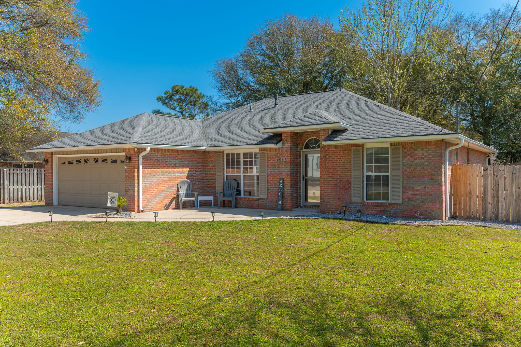 Welcome to 604 Huck Finn Dr.--where Modern Comfort Meets Southern Hospitality. If you've been looking for a place to hang your hat that feels just like home from the moment you pull into the drive, then look no further than this single-story Brick 3/2 - a gem located in South Crestview on a beautifully landscaped, level lot in the Riverchase subdivision. 
A Solid Foundation: Enjoy peace of mind with a new roof installed in 2021 and a new A/C system from 2020, ensuring your home stays cool and protected for years to come. Modern Touches Throughout: Step inside to discover an exceptionally clean interior featuring stainless steel appliances, updated cabinets, and handsome solid surfaces. 
Southern Living at its Finest: The 16x10 screened-in back porch is the ultimate spot for sipping sweet tea and enjoying the Florida breeze year round.
Room for Adventure: Need a place for the toys? This property boasts ample space for RV parking, making it the perfect home base for your next road trip or outdoor excursion.
Spacious & Private: The 1,673 sq. ft. layout features 3 bedrooms + bonus room and 2 full bathrooms, including a large master suite with a generous walk-in closet. And, YES, it has a soaker tub!
Outdoor Essentials: The fenced lot provides plenty of privacy, while the built-in sprinkler system keeps your lawn looking lush and green with minimal effort.
Whether you're hosting a backyard BBQ or enjoying a quiet evening on the porch, 604 Huck Finn is ready to welcome you home. 
*****The VA LOAN IS ASSUMABLE!
*****NO HOA
*****Fenced yard / Level Lot
*****RV Parking 
*****South Crestview.

The Listing Broker and the Seller are making no claims or warranties of such property. It is the sole responsibility of the buyer to inspect the property to determine its actual condition, size and best usage.