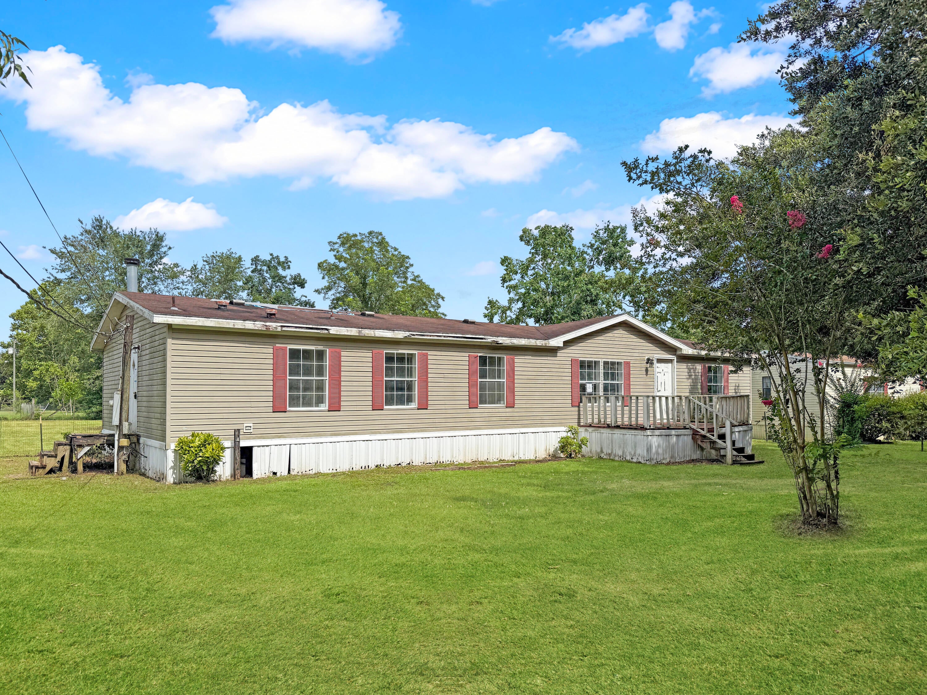 Great opportunity in a convenient Cantonment location with easy access to major roads, shopping, dining, and area amenities. No HOA! This manufactured home offers a spacious 3 bed, 2 bath layout and a sizable 0.51 acre lot, providing potential for renovation, updating, or redevelopment depending on buyer needs and applicable requirements. With no HOA, the property offers added flexibility for buyers who need space for work trucks, boats, RVs, trailers and more. Bring your vision and explore the possibilities this property has to offer. Call and schedule your showing today.