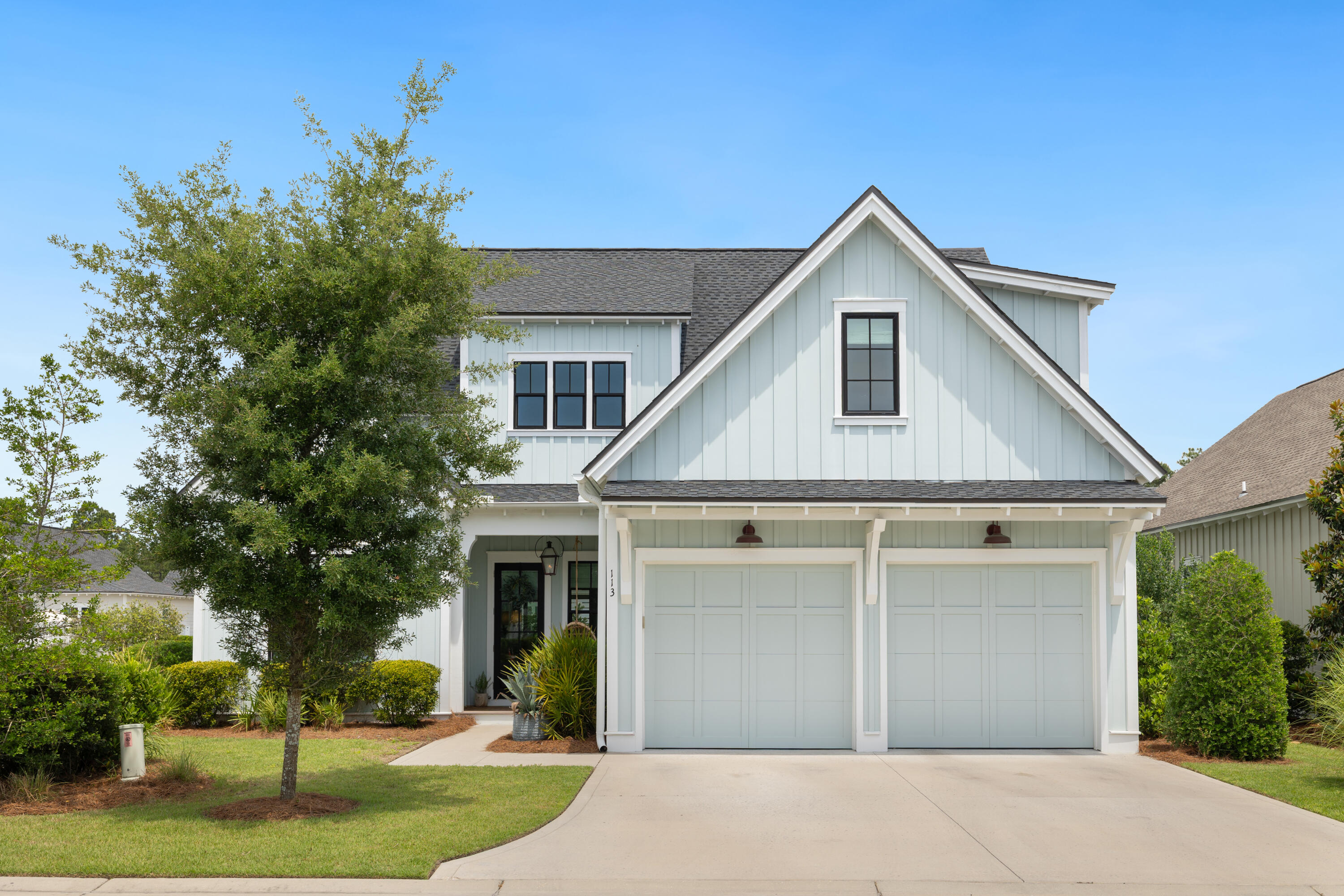 Corner-lot home in Watersound Origins with no direct side or forward-facing neighbor, 3,087 sq ft, 4 bedrooms each with its own ensuite bath, 2 of which are downstairs, plus a 400 sq ft bonus room that could serve as a fifth bedroom with two built-in queen beds tucked into a shiplap nook, the kind of cozy, tucked-away space that's perfect for reading on a rainy afternoon or sleepover they'll talk about for years. For this market and this price point, the square footage, ensuite count, and level of finish at 113 Catface Drive are difficult to match. 
Massive walk-in attic and whole-home water filtration system included. Built in 2022 and upgraded extensively: Level 6 Tesouro Bianco Dolomite kitchen countertops, Zellige tile backsplash and cabinets to the ceiling with open shelves, black windows, 16-foot slider to a screened back porch with an oyster shell plaster wood-burning fireplace with gas starter, two-story foyer dressed in all shiplap, crown molding throughout, Palecek lighting, and Emtek hardware on every door. After-market additions include a Garage Experts epoxy floor and custom cabinetry, Roman shades throughout, 
The fenced backyard is generously sized and framed by privacy landscaping, a true blank canvas ready for whatever you envision, whether that's a pool and spa, a garden, or a playset.
Lot measures 60x120x68x120 ft. 

Watersound Origins residents enjoy free access to the neighborhood par 3 golf course, Lake Powell, pool, fitness center, tennis courts, pickleball courts, playground, green spaces, walking trails and basketball court. The front of the community is actively expanding and already includes shops, restaurants, and an event venue all within walking or biking distance. Optional membership available to the private beach club.
