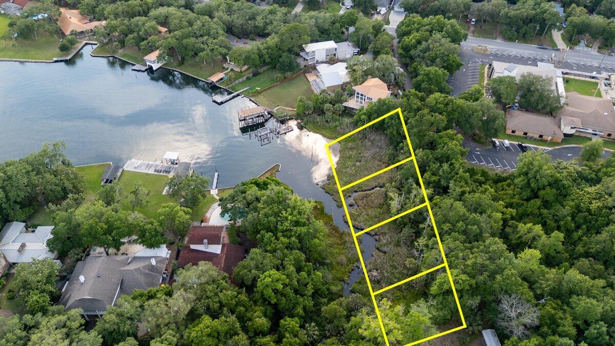 Rare opportunity to own a waterfront homesite located along the southern boundary of Petit Court, and along the Shores of Lake Como, connecting to the waters of the Choctawhatchee Bay. 

This sale includes a unique opportunity to purchase lots 2-5. 
Lot 2 is listed separately due to the deed, but all four lots must be purchased together for a total list price of $185k. 
Part of lot 3 is wetlands and all of lots 4 & 5 are designated wetlands. See additional documents. 
These additional lots provide added privacy, giving you nearly one acre and approx. 460 feet of waterfront property with natural beauty and convenient access to the bay. 

Buyers are strongly encouraged to conduct their own due diligence regarding wetlands, permitting, building requirements, and intended use of the property. See your agent for a list of resources.