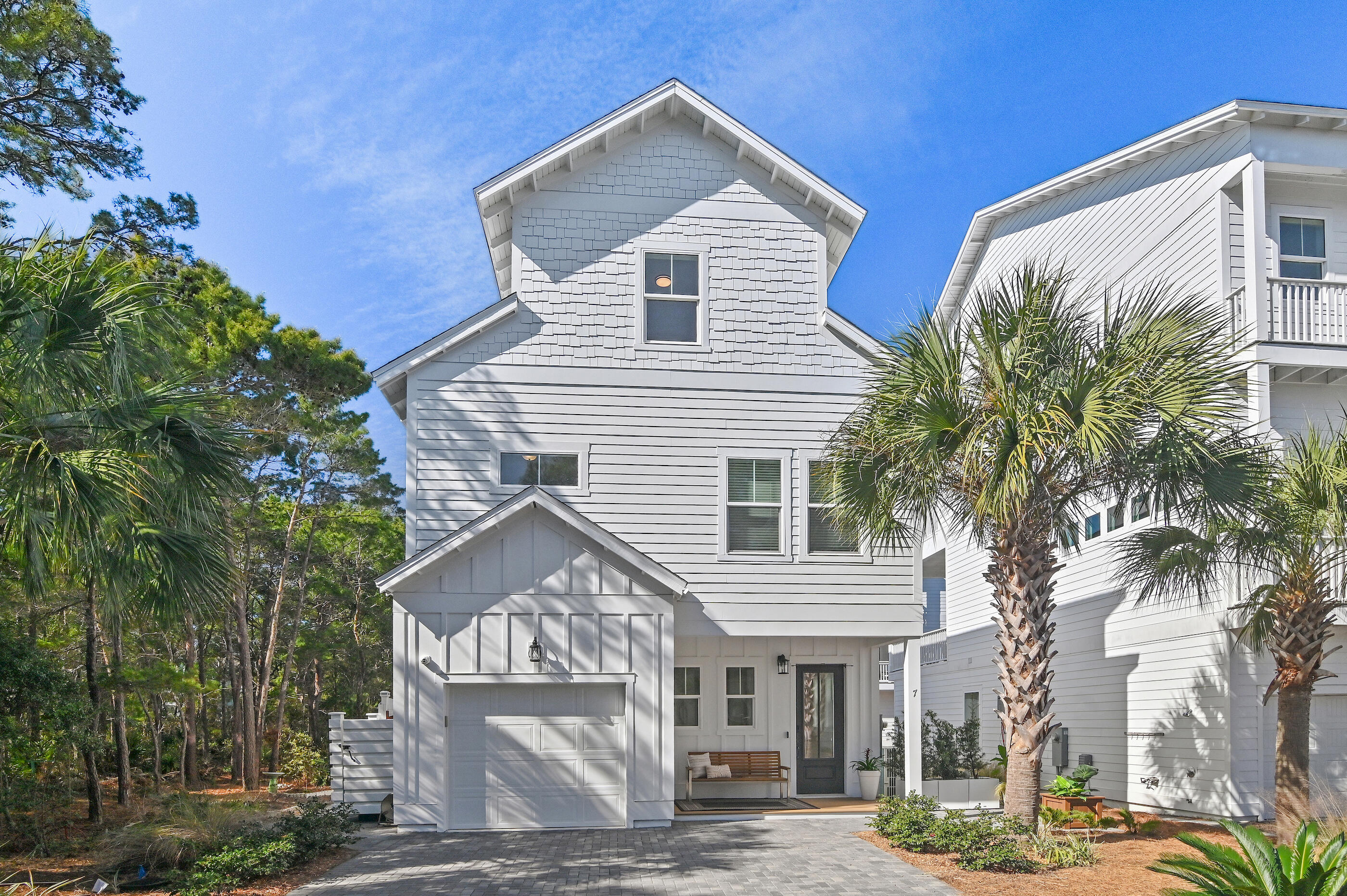 Now offered at a newly reduced price, this refined one-owner home blends coastal charm with extensive upgrades and thoughtful design. The main level features an electric linear fireplace with a natural limestone surround, impact-rated windows and doors, 10-ft ceilings, tongue-and-groove accents, and an upgraded kitchen with added cabinetry, pull-outs, a lazy Susan, and a window above the sink. 

Step outside to a standout 200-sq.ft. covered porch with Trex flooring, ceiling fans, Sunbrella shade curtains, outdoor speakers, fenced yard, redwood gate, outdoor shower area, and natural-gas grill hookup--perfect for relaxing or entertaining.

Upstairs, the second floor offers 9-ft ceilings, enhanced stairway details, and a beautifully updated primary suite with quartz countertops. The third floor includes hardwood flooring, a full bath, an owner's closet, a flex space, and a balcony with expansive views.

Additional upgrades include spray-foam insulation, a 2025 Mitsubishi zoned HVAC system, LED lighting, Sonos speakers, a security system, surge protection, new vent caps, and fresh interior and exterior paint.
Don't miss this opportunity -- schedule your showing today and take advantage of the new price!  Refined one-owner home with extensive upgrades and a warm coastal aesthetic. The main level features an electric linear fireplace with natural limestone surround, impact-rated windows and doors, 10-ft ceilings, tongue-and-groove accents, and an upgraded kitchen with added cabinetry, pull-outs, a lazy Susan, and a window above the sink. A standout feature is the 200-sq.ft. covered back porch with Trex flooring, ceiling fans, Sunbrella shade curtains, outdoor speakers, fenced yard, redwood gate, outdoor shower area, and natural-gas grill hookup. 



The 2nd floor offers 9-ft ceilings, enhanced stairway details, and an improved primary suite with quartz countertops. The 3rd floor includes hardwood flooring, a full bath, an owner's closet, a flex space, and a balcony with expansive views.



Additional upgrades include spray foam insulation, a 2025 Mitsubishi zoned HVAC system, LED lighting, a Sonos speaker system, a security system, surge protection, new vent caps, and fresh interior and exterior paint.