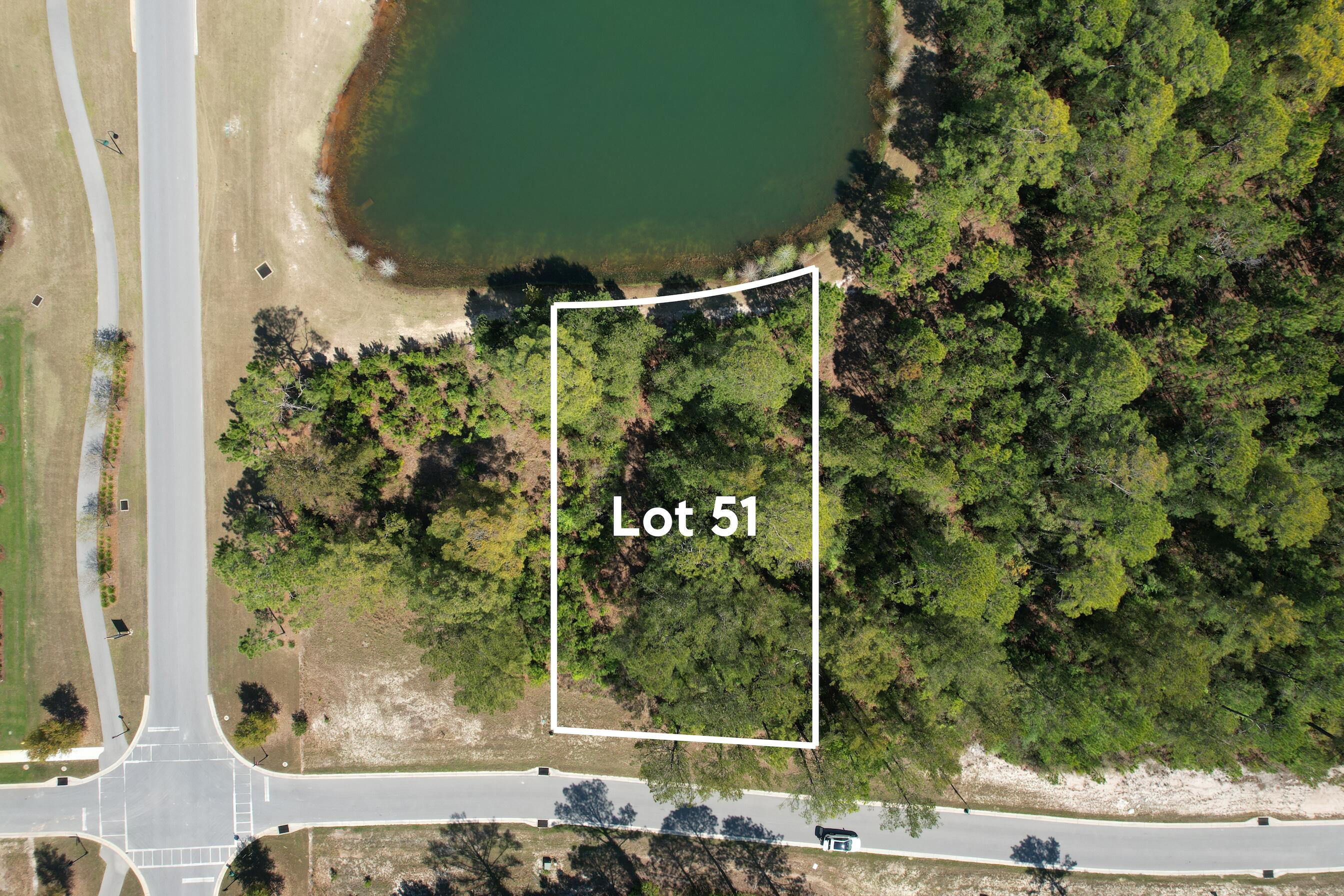 Build your custom dream home on this 0.34-acre waterfront lot in Hammock Bay located in the gated Steamboat Landing community in Freeport. This wooded homesite with pond view offers privacy and scenic surroundings, backing directly to a tranquil pond with full water views.

Ideally situated near the front of the neighborhood, this lot is within walking distance to the Bay Clubhouse and bayfront dock. Utilities are already in place, making it ready for your new construction home. Unlike many other sections of Hammock Bay, this lot allows you to choose your own builder, giving you flexibility to design a fully custom home.

Steamboat Landing is a gated community with access to all Hammock Bay amenities, including resort-style pools, fitness centers, walking and biking trails, pickleball courts, basketball courts, playgrounds, kayak launch, and multiple clubhouses. Convenient access to local favorites like Props Brewery, Abide Coffee, neighborhood shops, and Freeport Middle School.

Located just a short drive to the white-sand beaches of the Emerald Coast and 30A, this is a rare opportunity to own one of the last available lots in Steamboat Landing. Perfect for building a primary residence, second home, or investment property in one of Freeport's fastest-growing communities.

Buyer to verify all dimensions, zoning, flood zone, utilities, building requirements, HOA requirements, and other information deemed important.