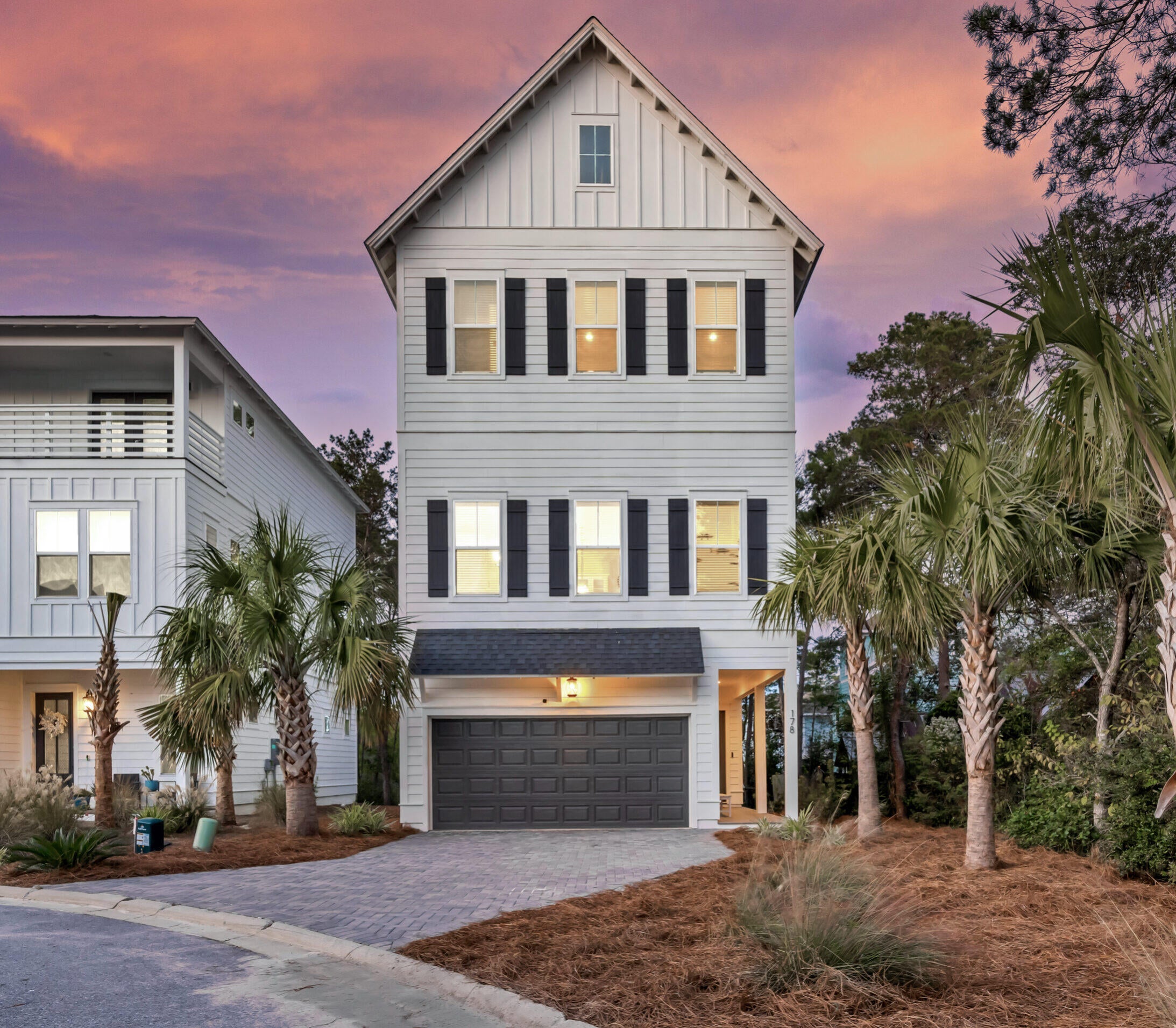 Fully furnished, STR-ready, and ideally located at the gateway to Scenic Highway 30A! This 2022-built coastal home offers 4 bedrooms, 3.5 baths, 2,483 square feet, a two-car garage, multiple balconies, and an established rental history--all less than a mile from the beautiful shores of Inlet Beach.
Designed across three spacious levels, the home comfortably sleeps up to 13 guests and features an open-concept living area, raised ceilings, hardwood and tile flooring, a large kitchen island, pantry, gas range, and multiple outdoor living spaces. The property is being offered fully furnished and includes five bicycles, beach equipment, and coolers, allowing a new owner to continue operating it as a vacation rental or begin enjoying it immediately as a second home.
The location places guests near Rosemary Beach, Camp Helen State Park, 30Avenue's shopping and dining, and the new pedestrian tunnel providing convenient passage beneath Highway 98 to the 30A corridor. The Ivy at Inlet Beach offers sidewalks and a shared community pool, and short-term rentals are allowed.
This property has already demonstrated strong rental potential, with reported gross rental revenue of $143,810 in 2024 under prior ownership. Reported 2025 revenue through September was $109,170, with approximately $21,000 in additional future bookings secured at that time. The property later changed ownership and management, creating an opportunity for a new investor to build upon its proven performance through optimized pricing, marketing, and guest amenities.
Additional opportunities may include adding a golf cart and enhancing the patio and outdoor entertainment areas to further increase guest appeal. Major systems, including the roof, HVAC equipment, and water heater, are reported as original to the 2022 construction.
Whether you are looking for an established short-term rental, a furnished coastal second home, or a property near Rosemary Beach and 30A, 178 Valdare Lane offers an appealing combination of location, rental history, modern construction, included guest amenities, and value-add potential.
