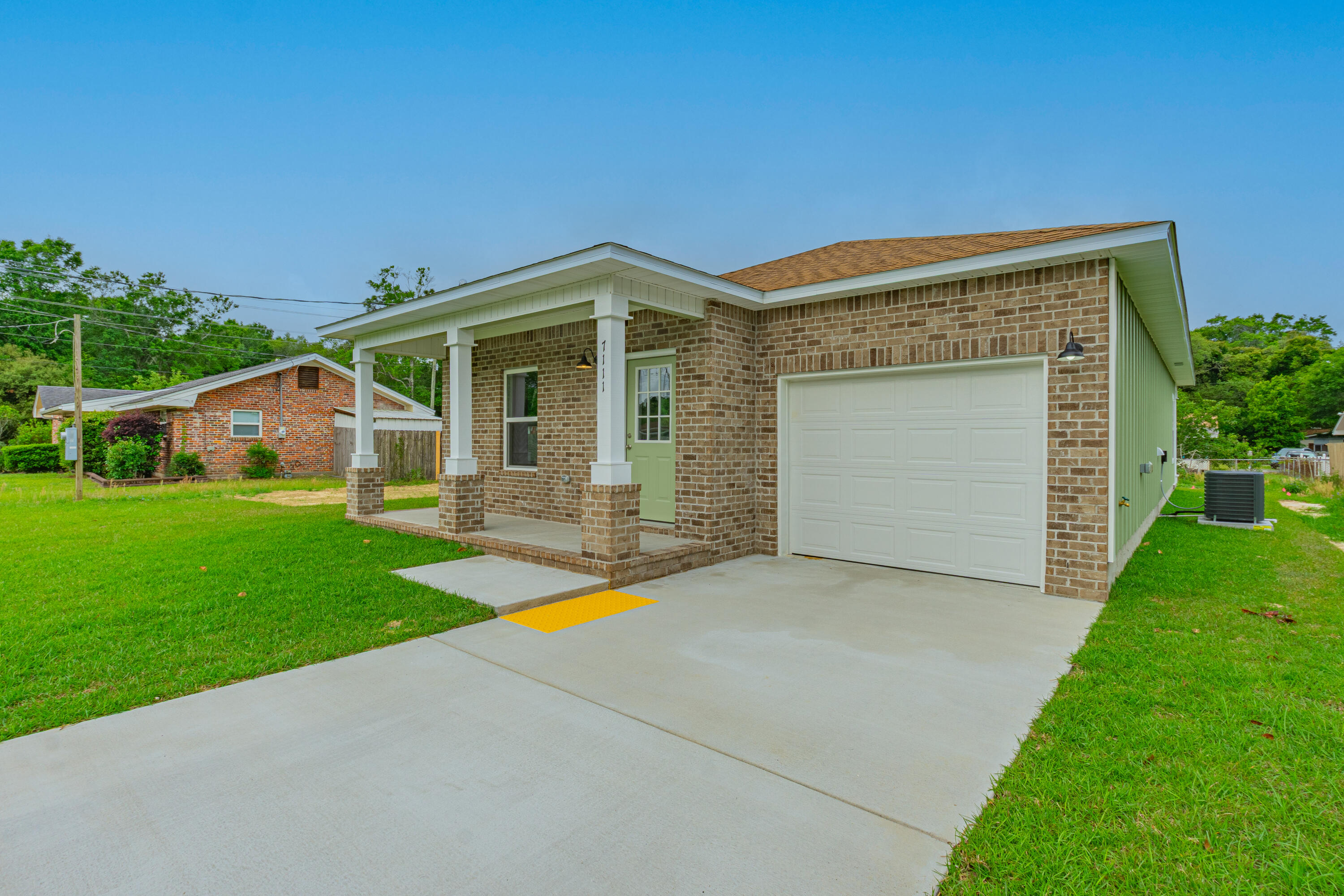 Looking for a brand-new home in Pensacola? This one's a smart buy!

Step inside and you'll love the open layout with luxury vinyl plank flooring, a gorgeous kitchen with granite and stainless appliances, and a bright owner's suite that feels like your own retreat. Outside, there's a covered back porch and a spacious yard -- perfect for relaxing or entertaining. And the location? Just minutes from I-110, making commutes to Beaches or Downtown a breeze.