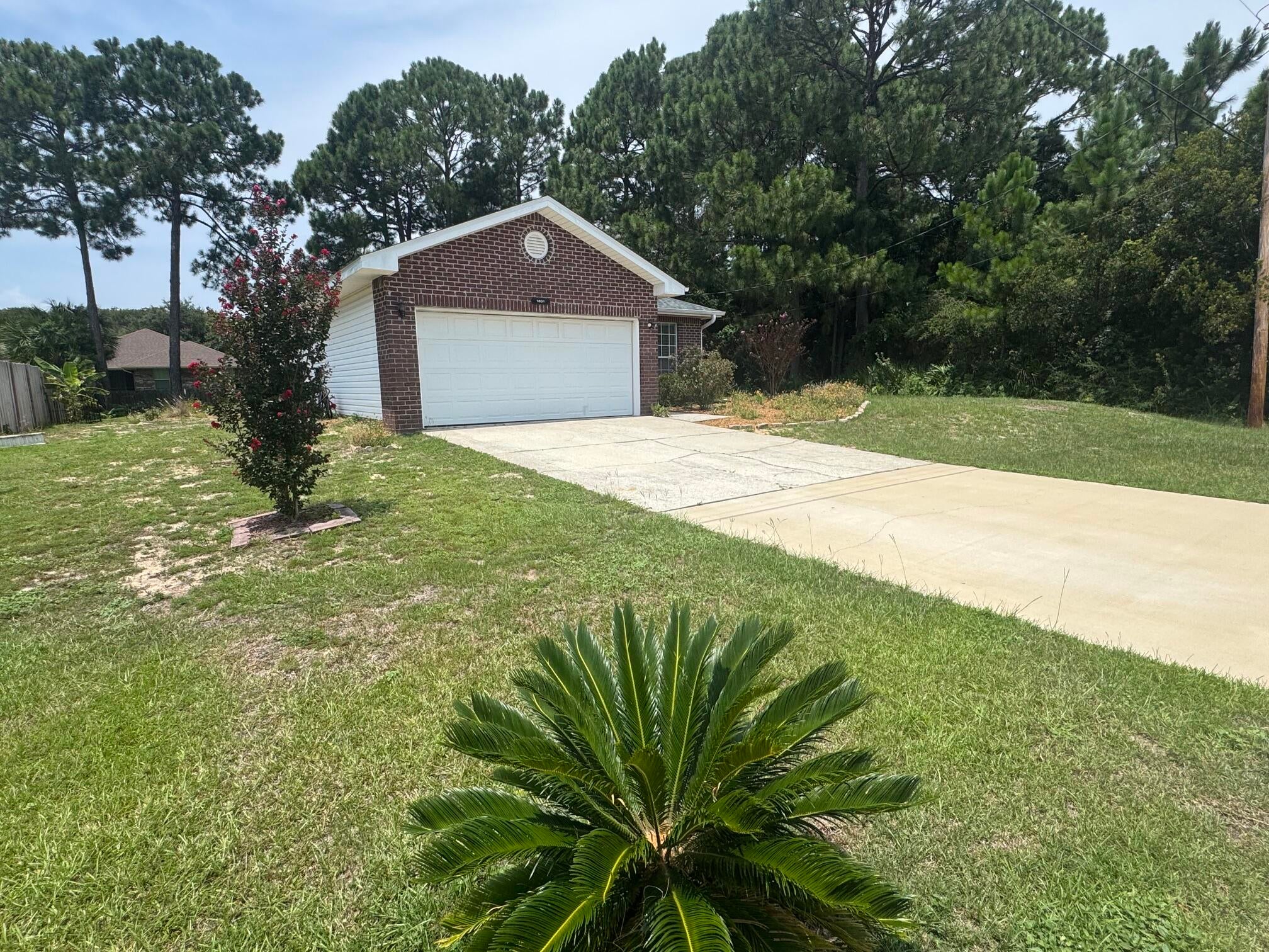 PRICE REDUCTION!!! Take a Look at this Great Priced 3/2 home in Gulf Breeze. The KITCHEN has been completely remodeled, including new cabinetry, hardware, granite countertops, and brand new appliances! Also, check out the beautifully updated Master Bathroom, including a modern double vanity with stylish mirrors, lighting and hardware. This home Features trey ceilings in the living room and master bedroom with recessed lighting and ceiling fans. Property has been updated with wood-look plank tile throughout the kitchen, master bedroom and master bathroom, as well as new carpet throughout the living room and remaining bedrooms. This home is conveniently located to nearby schools and just minutes away from the Woodlawn Beach Boat Ramp. Brand NEW ROOF in January 2026 completes this wonderful home. MOVE IN READY and no RENTAL Restrictions