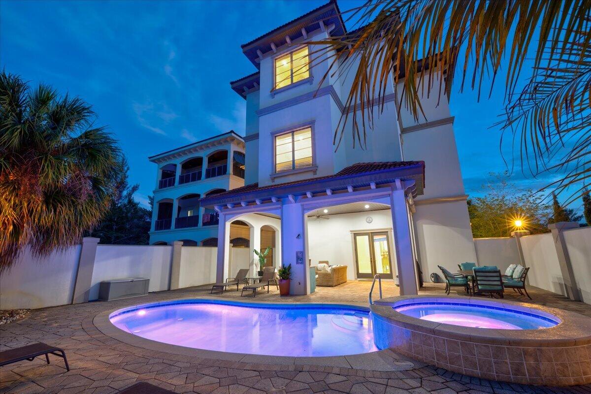 4,286 SF | 5BR | Gulf + coastal-dune-lake views | heated pool/spa | elevator | 2-car garage | no HOA | south of 30A | 2022 designer refresh | overlooking protected Topsail lands. 

52 Sandstone Street is Nestled Beside Topsail Hill Preserve, Stallworth Lake and 30A. 

Imagine stepping outside to the gentle whisper of a beach breeze and waves through the sandy pines - Tucked away on a private, HOA-free street on the peaceful west end south of 30A, 52 Sandstone Street  is one of the few properties built on 30A with true primary residence, private beach home, or true vacation rental. 

Primary & private beach home features: Two car garage, elevator, large closets, plenty of storage and entertainment space, fenced back yard, quieter street.

Security features: Hurricane shutters, whole home dehumidifier, 50yr clay roof. 

Vacation Rental features: proven vacation rental income, private heated pool, gulf views, heated spa, plenty of parking, entertainment space. 

Here, nestled beside two of the coast's most treasured natural havens, you are surrounded by deep serenity. A short stroll brings you to the quiet shore of Stallworth Lake--a rare coastal dune lake--while the protected wilderness of Topsail Hill State Preserve serves as your undisturbed backdrop. From the home's elevated position above the canopy, you enjoy a perspective few ever experience: breathing in the clean air amongst the pines, with peaceful glimpses over the trees to the shimmering Gulf beyond.