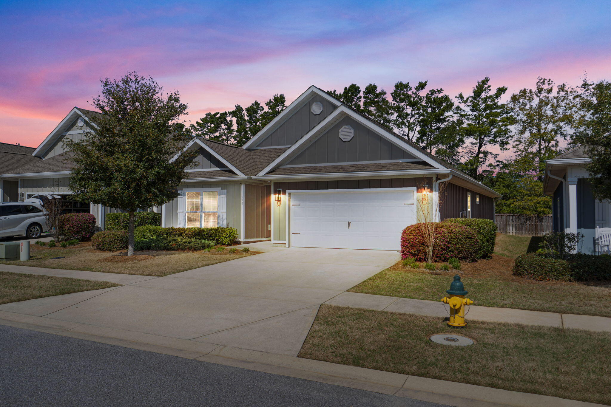Seller might be willing to do VA Assumable at a 2.625% for the right terms. This 4-bed, 2-bath home located in a desirable gated community in Hammock Bay. This spacious home offers the perfect blend of comfort, privacy, and low-maintenance convenience with yard maintenance included in HOA fees. Step inside to discover a functional and inviting layout with generous living spaces, ideal for both everyday living and entertaining. The home features four well-sized bedrooms and two full bathrooms designed for comfort and practicality. Outdoors is perfect for relaxing, entertaining guests, or cooling off during warm summer days. Residents also enjoy access to community pools, pickleball courts, adding a fun and active lifestyle element right in the neighborhood. Tesla charger included and whole house surge protector installed by CHELCO