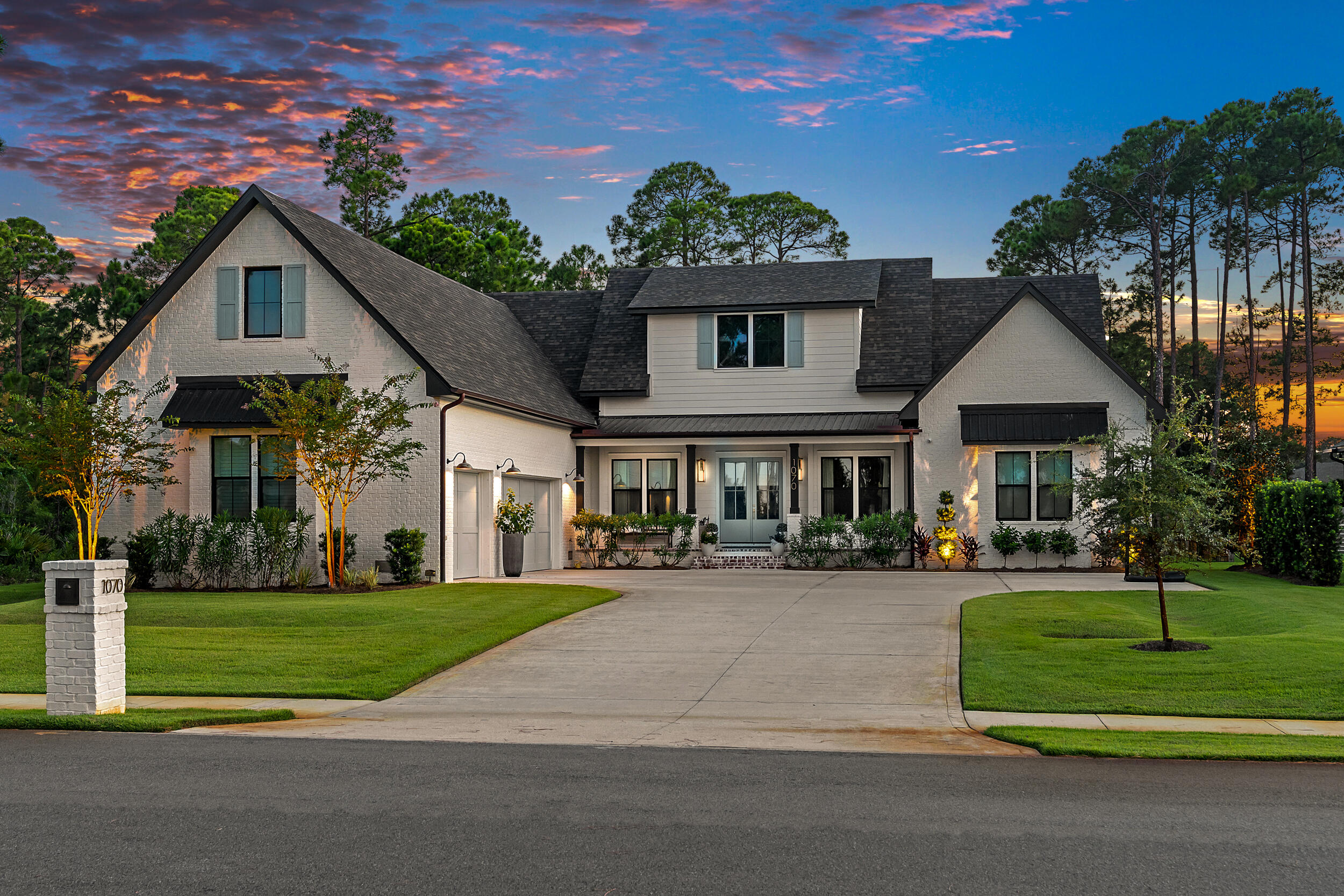 Showings begin 4/15/26. Coastal elegance meets everyday comfort in this stunning 5-bedroom, 4.5-bath custom home by Cogent Building Group and Bird Dog Design Co. Thoughtfully curated for a growing family, this home also features a private office, separate media/living room, and expansive 3-car garage. Enjoy bay views from the front porch and relax in the 40' gunite pool with sun ledge and pool heater, situated on over 1/2 an acre. Interior highlights include 10' ceilings, vaulted living and primary bedrooms with white oak beams, engineered hardwood flooring, designer lighting, and custom window treatments. The chef's kitchen is equipped with quartzite countertops, Thermador gas cooktop, soft-close wood cabinetry, and a filtered drinking water system... Bathrooms feature marble countertops and designer tile throughout. Built for both beauty and performance, the home offers foam insulation in ceilings and between walls, 2x6 exterior construction, vinyl impact-rated windows and doors, solid core interior doors, and insulated garage doors. Additional features include two gas fireplaces, Calacatta marble fireplace surround, reclaimed brick on the front and back porches, copper gutters, custom built-out closets, and a Sonos sound system with ceiling speakers in both living areas and on the porch. Smart and secure, the property also includes a full alarm system, three exterior cameras, a safe room/gun room in the garage, and an electric car charger. Whole-home water filtration and air purification systems provide added peace of mind for health and wellness. Located in a desirable neighborhood with walking paths, ponds, pickleball, tennis, basketball, restrooms, parks, and more.