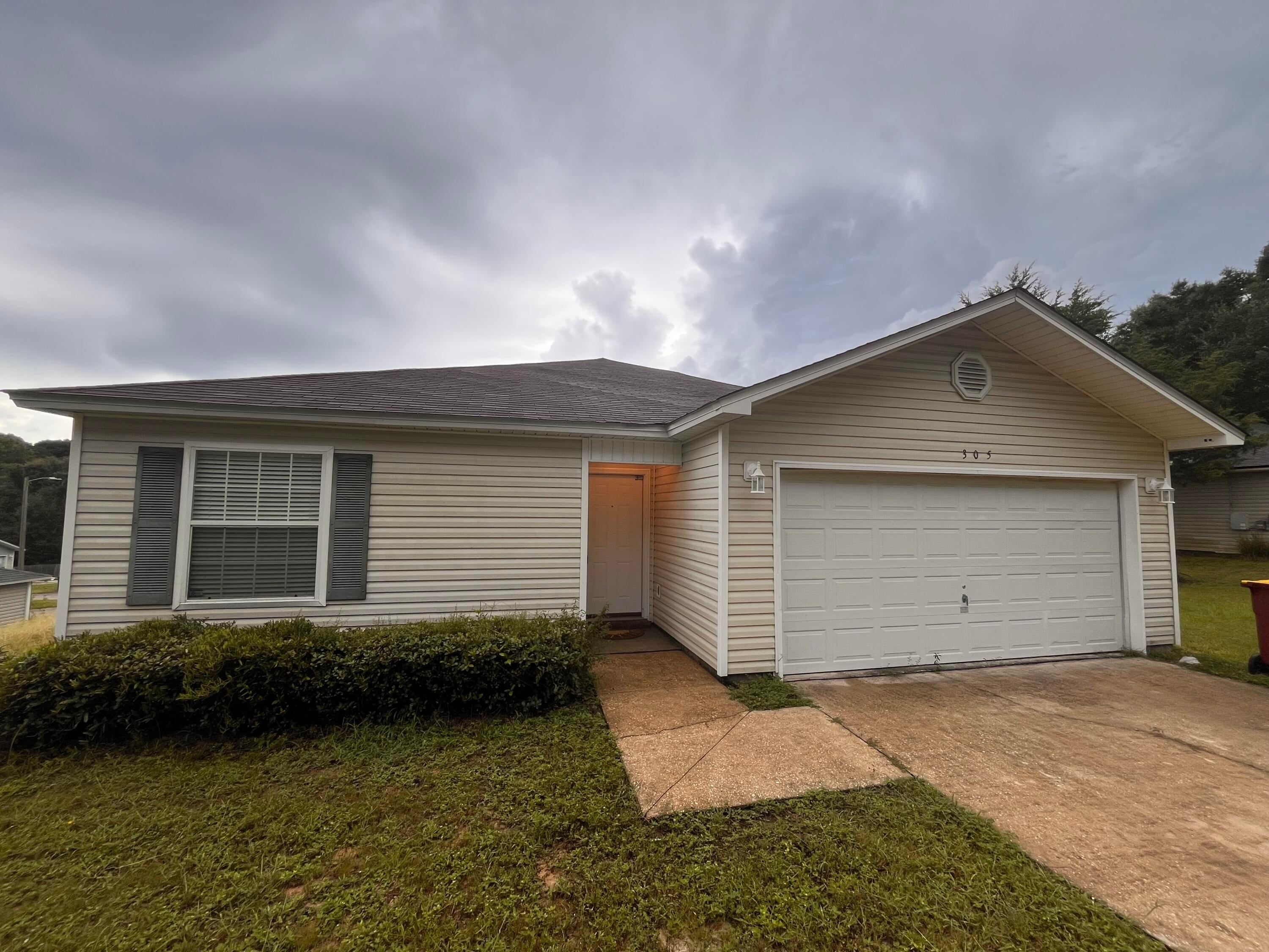 Welcome to 305 Seclusion Boulevard! Freshly painted throughout with brand-new carpet, this well-maintained 4-bedroom, 2-bath home offers a great opportunity for those looking for the value of four bedrooms in a convenient Crestview location.

The open, split-bedroom floor plan makes great use of the home's layout, with a comfortable living area and kitchen with pantry. The primary suite features a walk-in closet, and the home also includes a two-car garage for additional parking and storage.

Centrally located in Crestview with convenient access to shopping, dining, area military bases, and the beaches of Northwest Florida.

No smoking inside the home. Pets may be considered with owner approval and a $500 non-refundable pet fee.