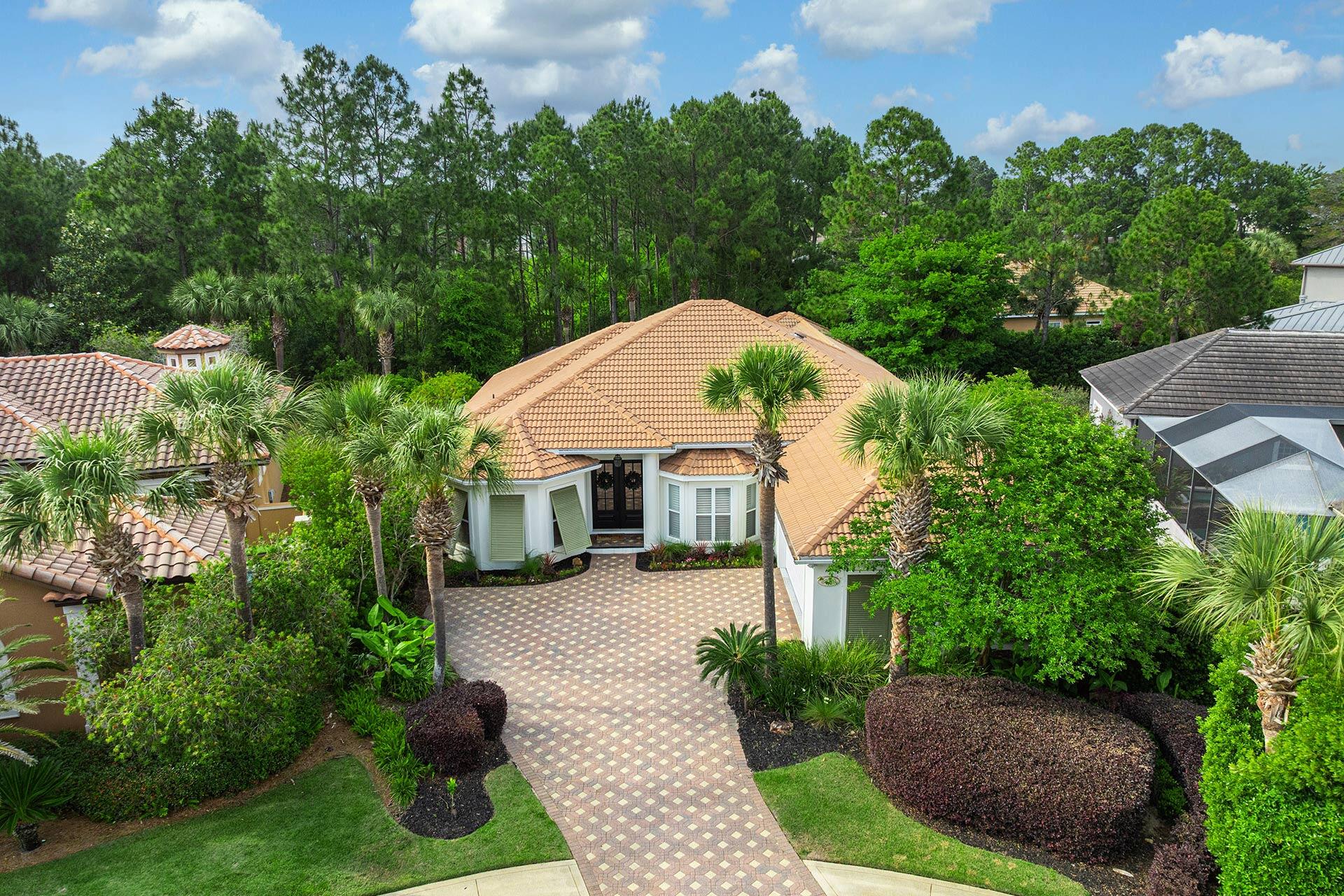 This lovely Florida Coastal home offers a  total of 4 bedrooms, 3 1/2 baths plus a sizable office space & detached guest quarters with full kitchen. Plantation shutters, granite counters, & outdoor cooking area only add to the homes appeal. To insure your outdoor pleasure when you're not on the beach across from the main gate there is a 30x15 covered heated pool. Oversized two-car garage & spacious 0.26 acre lot in the highly sought-after gated Destiny East Subdivision make this home the perfect choice. Positioned on a quiet cul-de-sac you can golf-cart to Destin Commons, Silver Sands Outlet Mall and a multitude  of shopping & dining spots along Scenic 98. This home provides the opportunity to experience countless days of Emerald Coast luxury. Call and schedule your private viewing today!