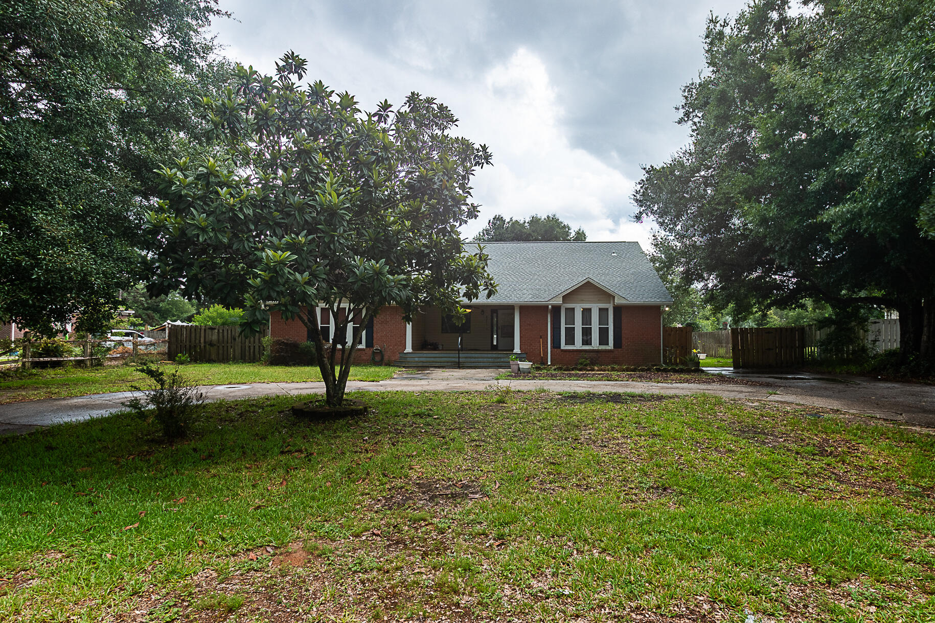 Professional photos coming soon! Nestled in the heart of Navarre, you'll feel right at home in this cozy 4 bedroom(split floorplan), 2 bath home that sits on just shy of .5 acres! Updated in the last several years with a new roof and HVAC system so that will speak music to your insurance agent's ears!  
If you enjoy entertaining or like your home to feel open, this home has an open kitchen leading into your living/dining space, and an outdoor deck perfect for grilling or enjoying our nice FL sun. There is also an extra bonus room that could easily be an office or 5th bedroom. Whether it's going to be yours or you're looking for an investment property, it's great for either!  Call today to make this house your ''home''!
