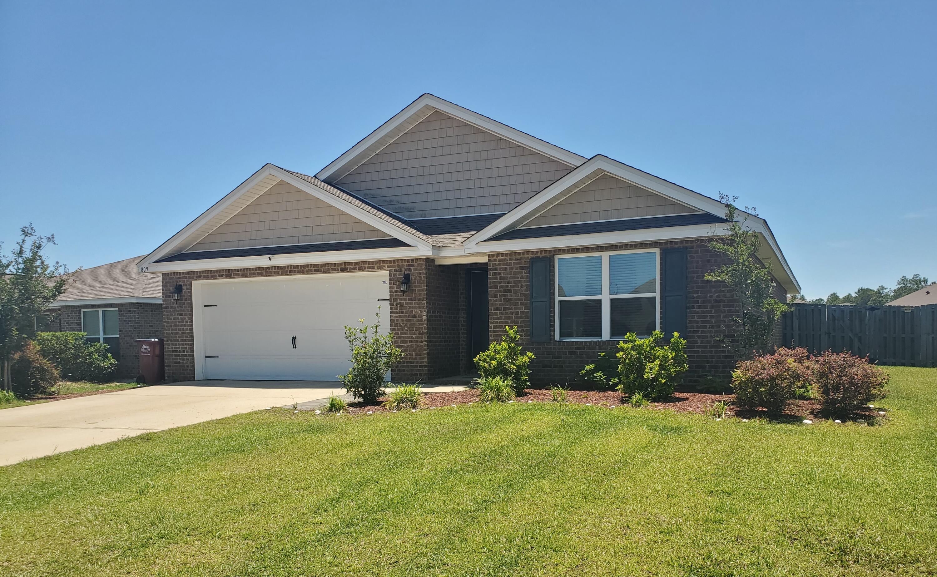 Brand new carpet in bedrooms! Well-maintained 4/2 Cali floor plan located in Redstone Commons, featuring durable LVP flooring, granite throughout, and spacious open floor plan. Freshly painted front and back doors offer enhanced curb appeal. Foyer opens into lovely kitchen with large center island, stainless steel appliances (newer refrigerator), and walk-in pantry. Kitchen overlooks living and dining areas for a spacious open-concept design.
  
The primary suite offers a spacious layout with double vanity and generous closet space. A true split floor plan provides privacy and separates the primary from three additional bedrooms, which are nicely sized to accommodate guests, office, or hobbies. 

Step outside to a covered back patio overlooking a privacy-fenced backyard, ideal for outdoor entertaining. Garage has a custom-installed flaked epoxy floor. 

Redstone Commons' numerous amenities include pool, clubhouse, picnic area, playground, dog park, and upscale pavilion with outdoor kitchen and seating, creating a perfect setting for recreation, gathering and daily enjoyment. The community has underground utilities and is conveniently located near shopping, dining, medical facilities, and local bases. Quick move in possible.