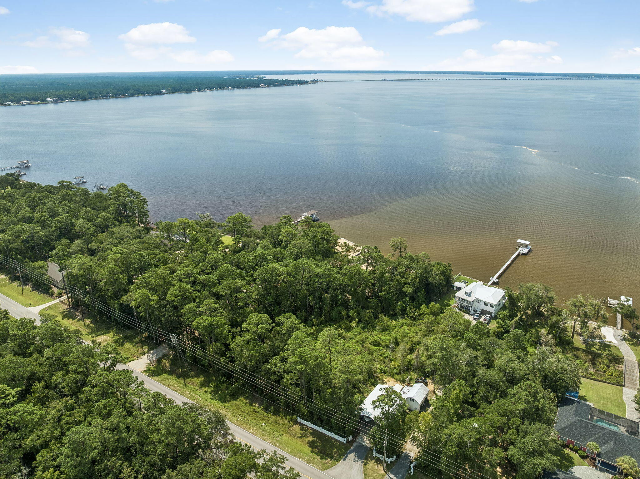 Rare opportunity to own approximately 3.06 acres in Freeport along County Highway 83A W. This vacant residential parcel offers ample space and flexibility for a future homesite in an established area near Choctawhatchee Bay. Conveniently located with access to Freeport amenities, Highway 20 and the surrounding bay communities. Buyer to verify all dimensions, zoning, utilities, building requirements and development feasibility.
