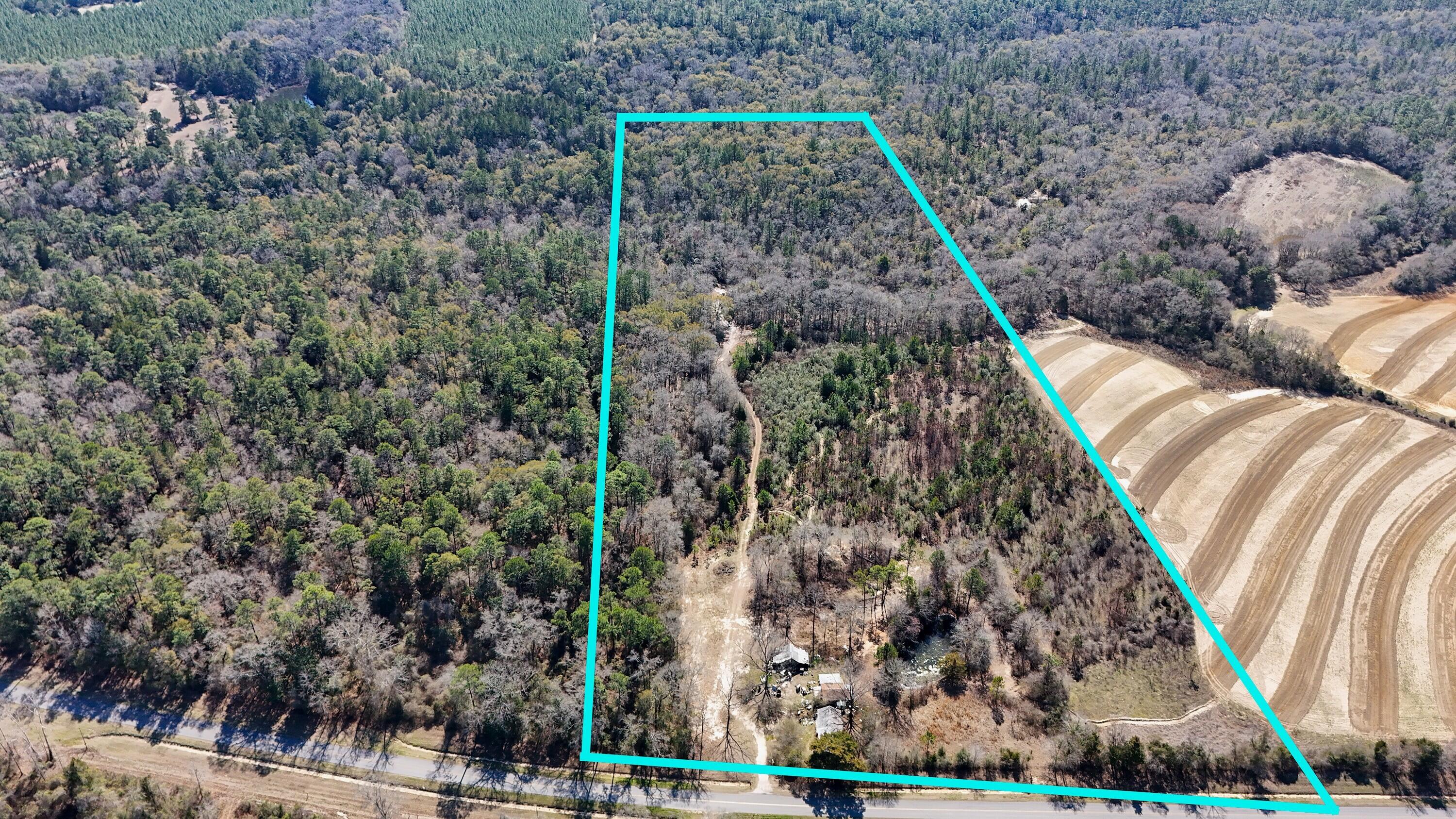 WHAT IT IS: 
37 acres of waterfront Florida beauty in DeFuniak Springs. Crystal clear creek frontage. Wildlife everywhere. A large pond! No flood zone, no HOA! Privacy you can feel. A place where the only sounds at night are frogs, crickets, and the breeze through the pines. Utilities already in place for the first homesite! This property already has the kind of natural features developers and dreamers spend YEARS searching for: 
Natural Bridge Creek running through the property AND a large pond
 Multiple private homesite opportunities
 Highway access
 Room for horses, barns, shops & guest homes
WHAT IT COULD BE: 
A multi-generational family compound where grandparents, kids, and grandkids all build together while still having privacy,A luxury rural estate with a winding private drive,  bridge crossing over the creek, horse pasture, stocked pond, and custom homes tucked into the trees.
A weekend hunting and recreation retreat where mornings start with coffee overlooking the water and evenings end around a firepit under the stars.
A legacy property.
The kind that stays in a family for generations.
The kind people regret not buying when they had the chance.
Most land gets cleared.
Most land gets divided.
Most land loses what made it special.
But this one?
This one already feels like something bigger.