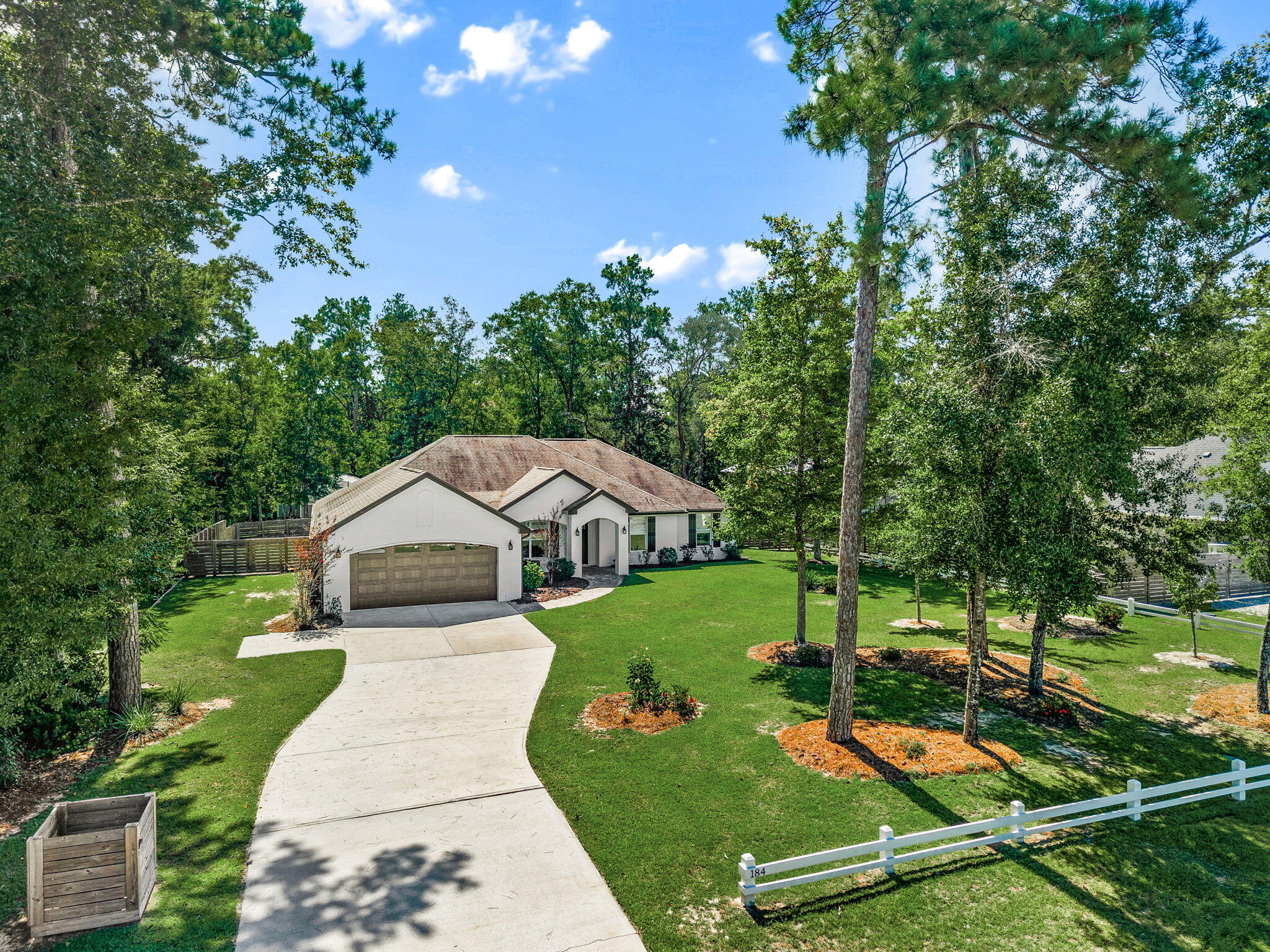 A little bit of country, a peek-a-boo view of the bay, and a whole lot of custom! Tucked into the quiet, desirable LaGrange Shores community, this exceptional half-acre property offers privacy, space, room for your boat or RV, and NO HOA. From the impressive 8' Craftsman front door to the 10' foyer with white shiplap, custom details are found throughout this beautifully designed home.
The open living area features a double tray ceiling, brick gas fireplace and French doors overlooking the fenced backyard. The stunning kitchen showcases Fantasy Brown leathered granite, a custom herringbone backsplash, white shaker cabinetry, under-cabinet lighting, custom range hood and a 10' island with deep composite sink. Black stainless appliances include a 5-burner gas range with pot filler and a newly installed double oven.
Beautiful 6'' wire-brushed Hickory hardwood floors run throughout the home--NO CARPET! The spacious primary suite offers backyard access, a shiplap accent wall and a spa-like bath with a massive soaking tub, double-head shower, quartz counters and two custom-fitted walk-in closets. Three additional bedrooms and full bath enjoy privacy on their own side of the home.
An oversized 24'6'' x 24' garage accommodates a full-size truck and includes an epoxy floor and walk-in closet. Outside, you'll find a large powered and lighted shed, fenced side and back yards, RV hookup and plenty of room for outdoor toys. A little bit of country, a peek-a-boo view of the bay, and a whole lot of custom! Tucked into the quiet, desirable LaGrange Shores community, this exceptional half-acre property offers privacy, space, room for your boat or RV, and NO HOA. From the impressive 8' Craftsman front door to the 10' foyer with white shiplap, custom details are found throughout this beautifully designed home.
The open living area features a double tray ceiling, brick gas fireplace and French doors overlooking the fenced backyard. The stunning kitchen showcases Fantasy Brown leathered granite, a custom herringbone backsplash, white shaker cabinetry, under-cabinet lighting, custom range hood and a 10' island with deep composite sink. Black stainless appliances include a 5-burner gas range with pot filler and a newly installed double oven.
Beautiful 6" wire-brushed Hickory hardwood floors run throughout the home--NO CARPET! The spacious primary suite offers backyard access, a shiplap accent wall and a spa-like bath with a massive soaking tub, double-head shower, quartz counters and two custom-fitted walk-in closets. Three additional bedrooms and full bath enjoy privacy on their own side of the home.
An oversized 24'6" x 24' garage accommodates a full-size truck and includes an epoxy floor and walk-in closet. Outside, you'll find a large powered and lighted shed, fenced side and back yards, RV hookup and plenty of room for outdoor toys. Tankless water heater, custom trim and built-ins complete the package. A true hidden gem for those seeking peace, space and exceptional craftsmanship--with the bay just beyond your doorstep and the Freeport Marina minutes away.