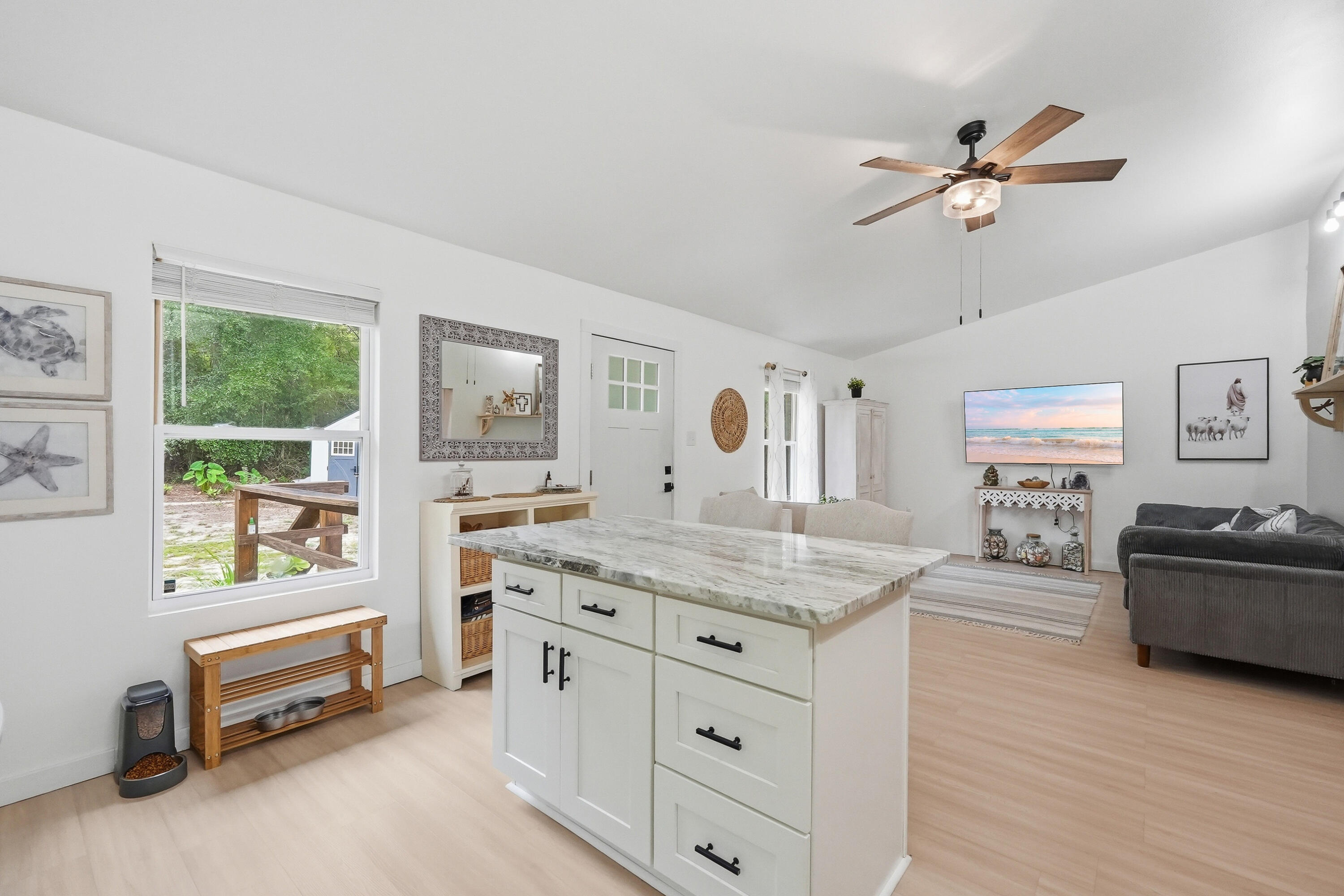 Country living meets modern comfort on nearly 5 acres! From the time you walk in you feel like you're home. If you've been searching for a move-in ready home with land, privacy, and room to enjoy the outdoors, this updated home is a must see.
Thoughtfully renovated from top to bottom, the home features a new metal roof, new HVAC, updated flooring, new appliances, white shaker soft close cabinetry, quartz countertops, center island and a beautifully remodeled bathroom. Every detail has been designed to maximize comfort and style.
One of the standout features is the spacious screened porch perfect for entertaining, relaxing with family and friends, or enjoying peaceful mornings overlooking your property. A front deck provides even more outdoor space.
Approximately 2 acres cleared, creating usable space for a garden, workshop, recreational vehicles or add a pool. Solar powered entry gate adds to the privacy.
Just minutes to major highway 90 and 285/I10 and approximately 15 minutes to historic downtown Defuniak Springs, shopping and restaurants.
Call for your private showing today.