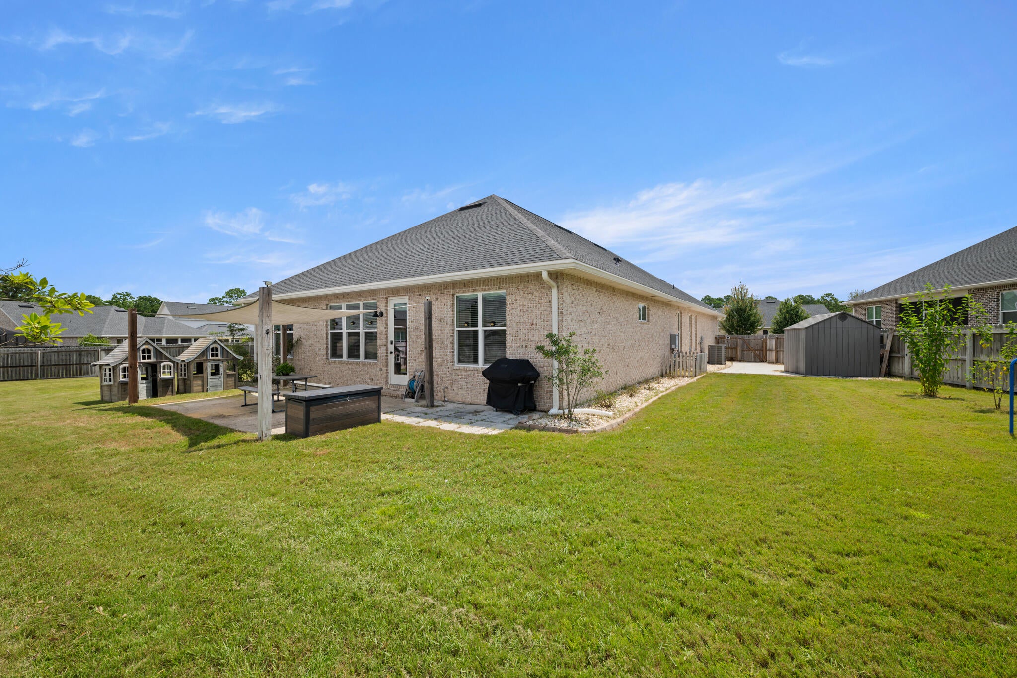 Beautiful 4-bedroom, 3-bath home on a generously sized cul-de-sac lot, offering an exceptional combination of space, upgrades, and functionality. Featuring over $70,000 in premium lot and upgrades. The open-concept floor plan showcases a stunning kitchen with quartz countertops, Legacy cabinetry, under-cabinet lighting, Bosch appliances, large island, custom shelving, and farmhouse-style doors. A builder-enclosed, climate-controlled flex room adds valuable year-round space for an office, gym, media room, or additional living area. The split-bedroom layout provides privacy and flexibility for guests or multigenerational living. Outdoors, enjoy an extended 3-car driveway, side-yard concrete pad, fully fenced backyard, low maintenance rock landscaping, enlarged patio, and natural gas grill line. Convenient to Eglin AFB, VPS, Destin, Niceville, Fort Walton Beach, and Emerald Coast beaches.